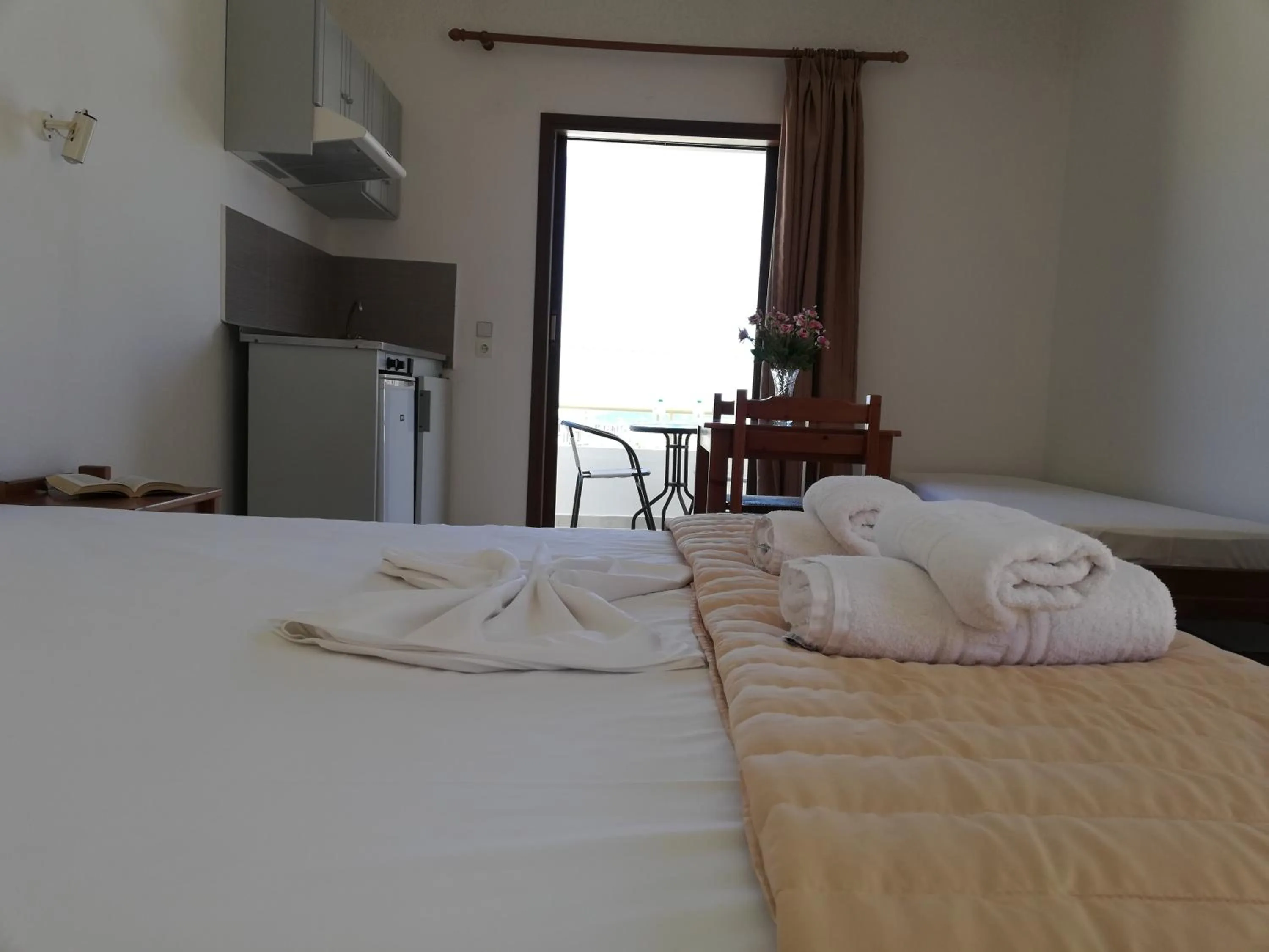 Bed in Karmi Apartments