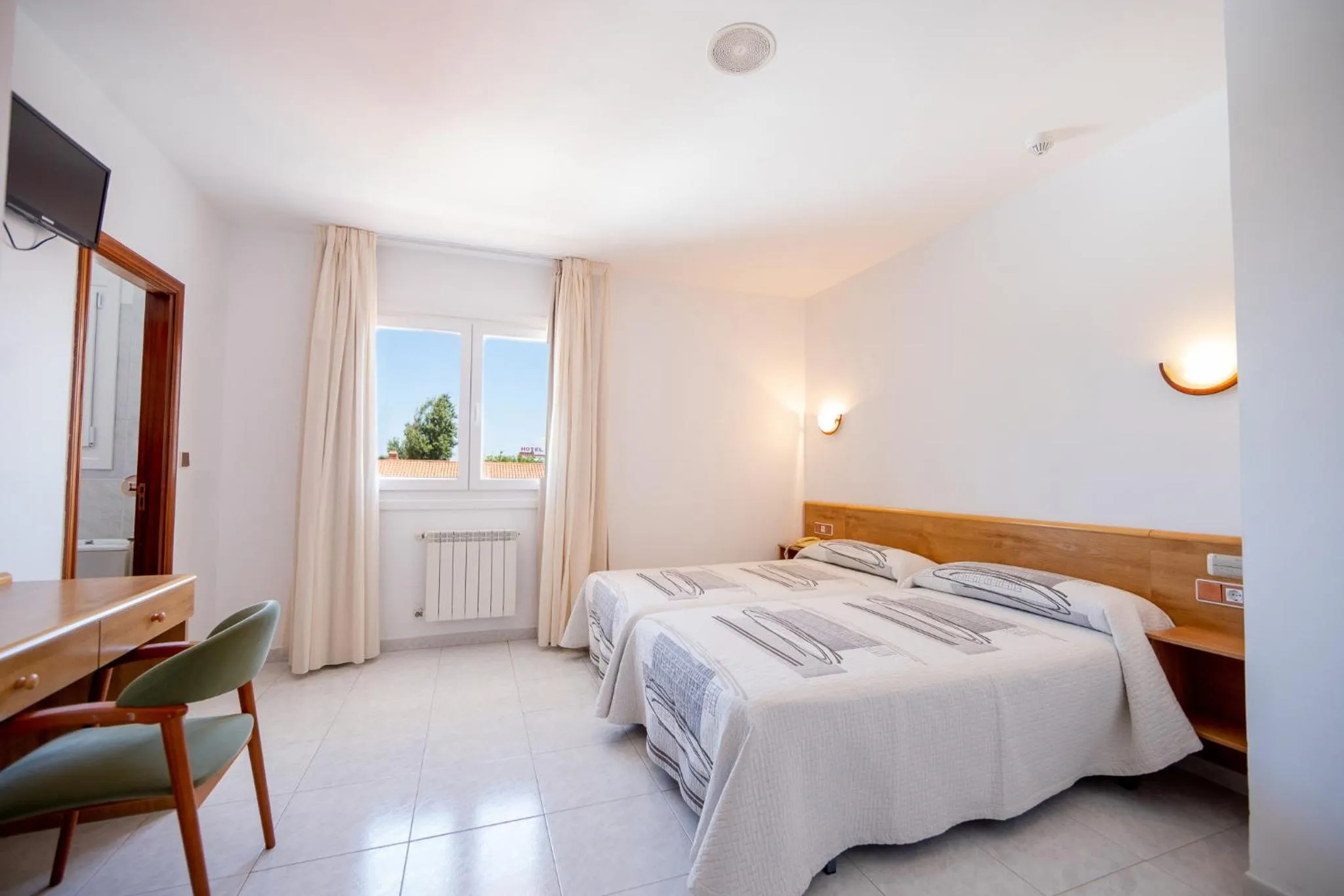 Bed in Hotel Paraimo