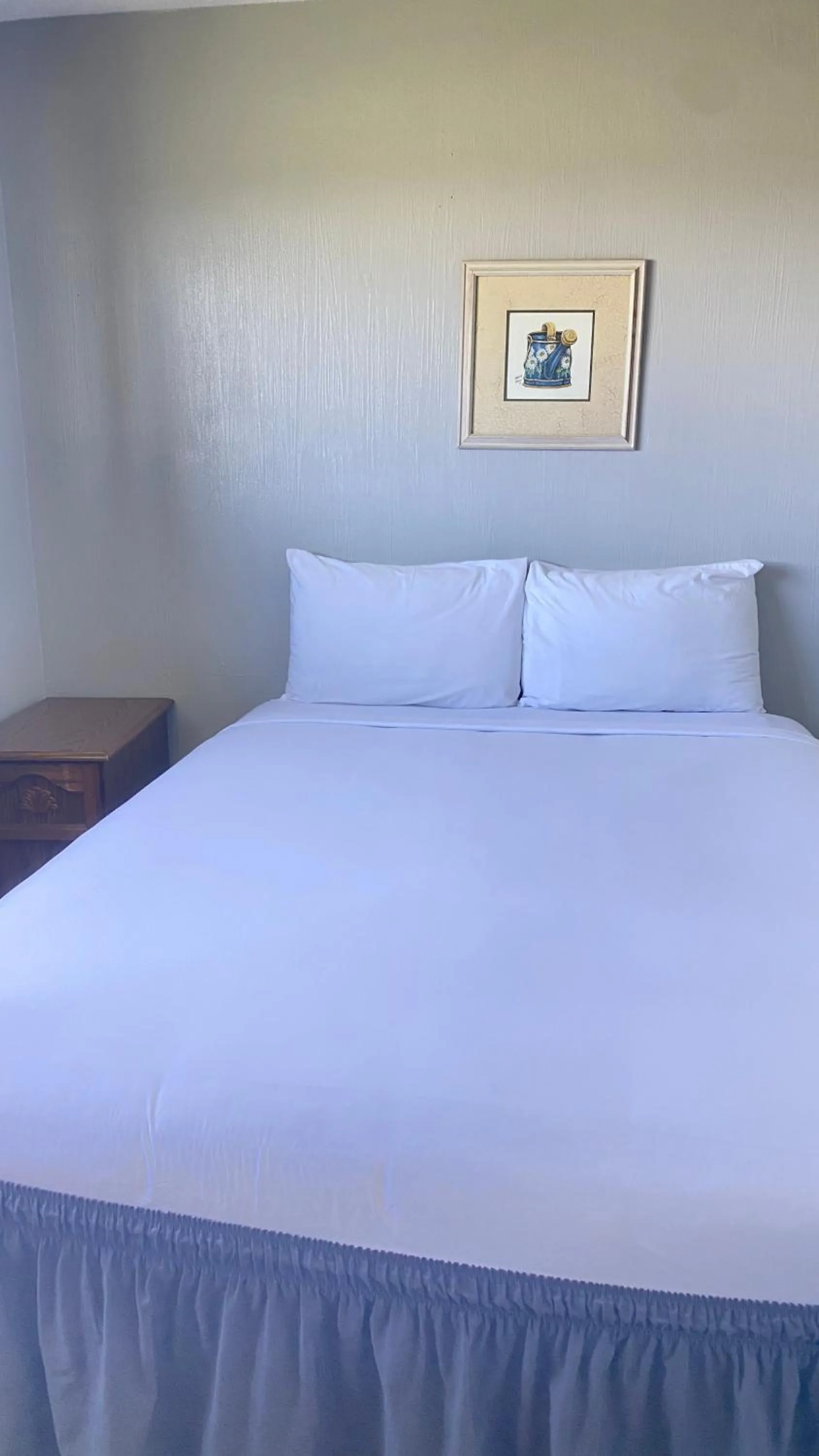 Bed in Ocean Shores Inn & Suites
