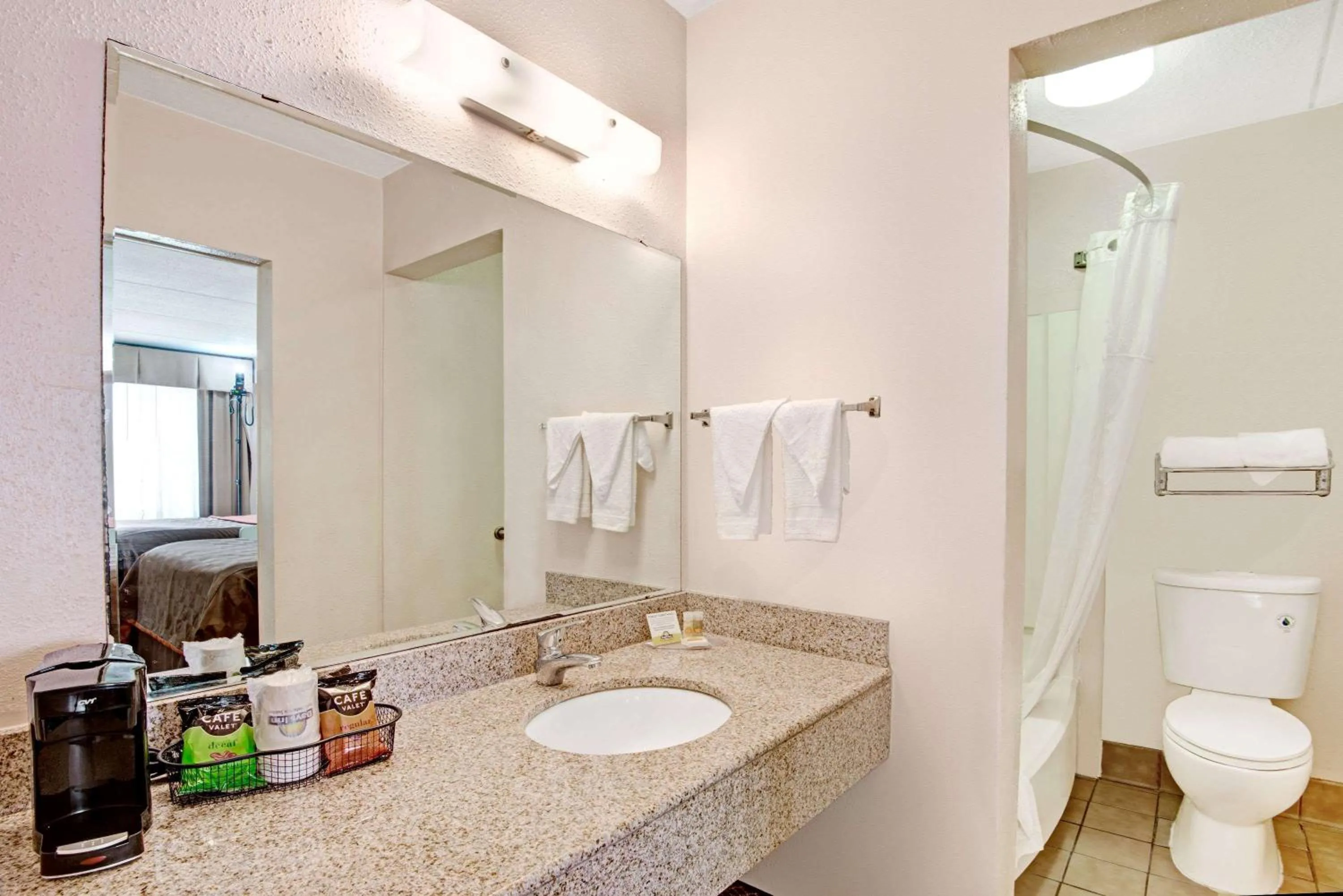 Photo of the whole room, Bathroom in Deluxe Inn San Antonio Near Lackland AFB