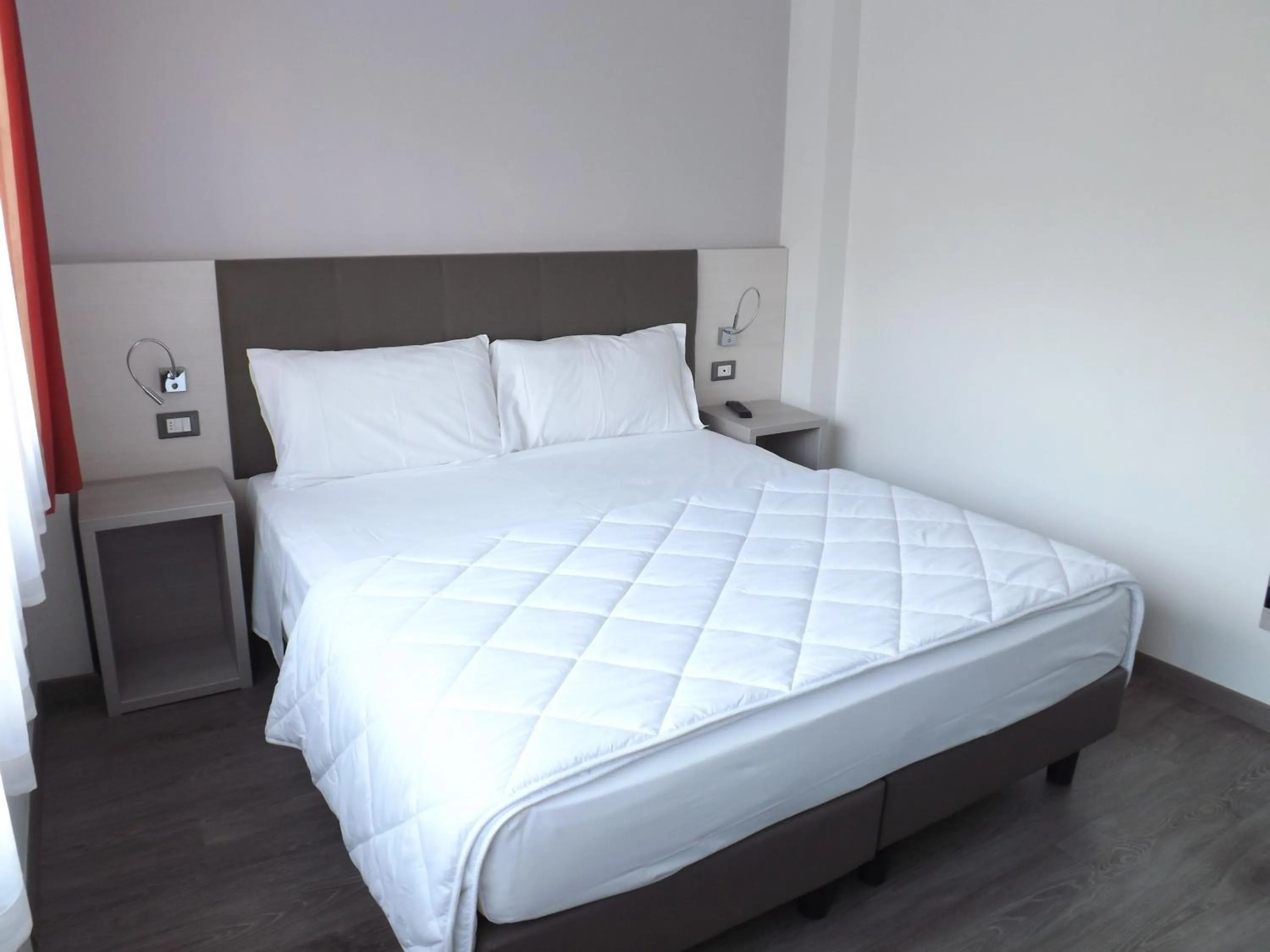 Bed in Hotel Ariston