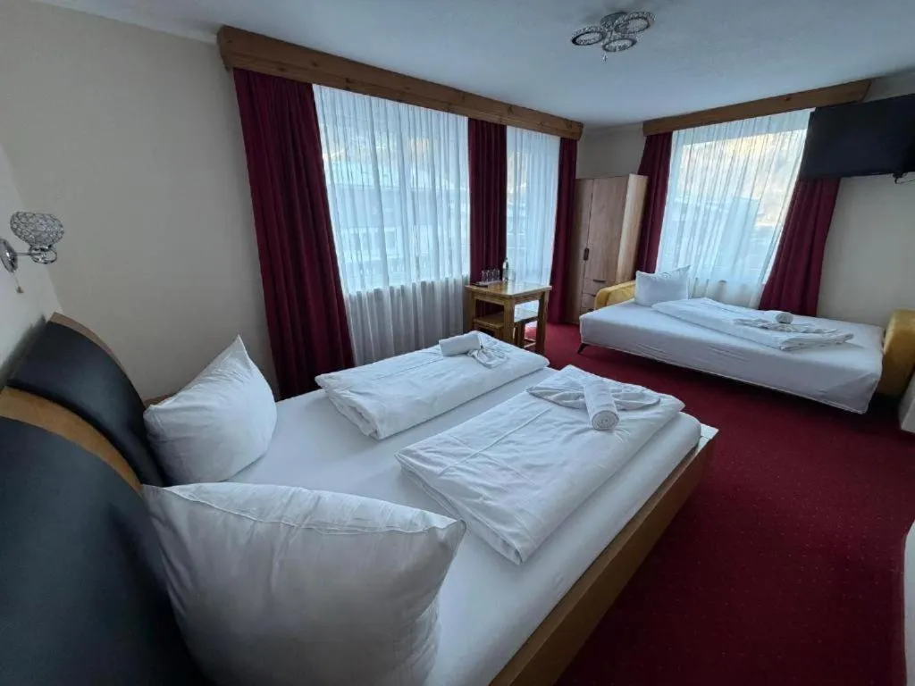 Photo of the whole room, Bed in Hotel Gundl Alm