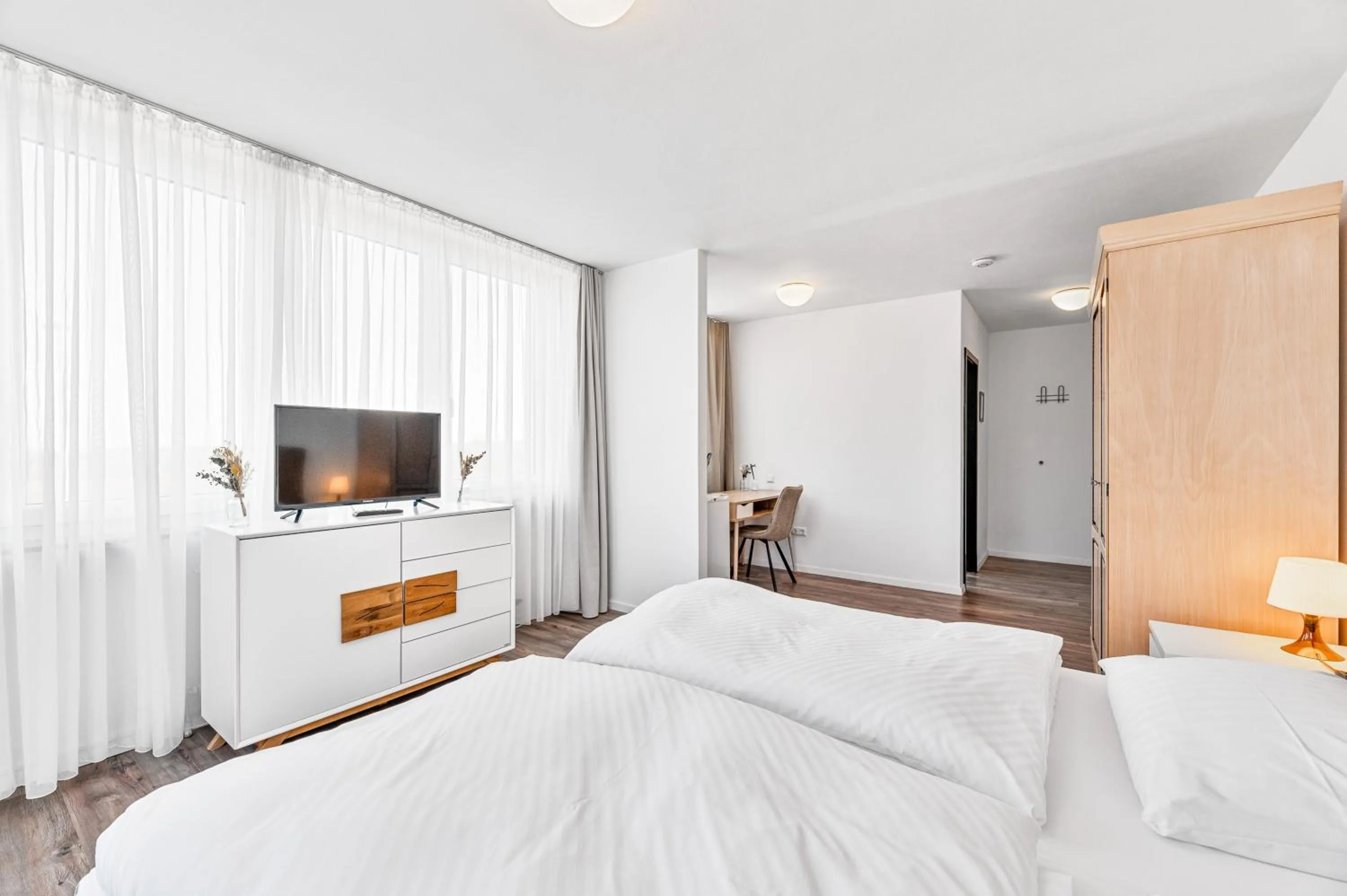 Communal lounge/ TV room, Bed in Atelier Guesthouse