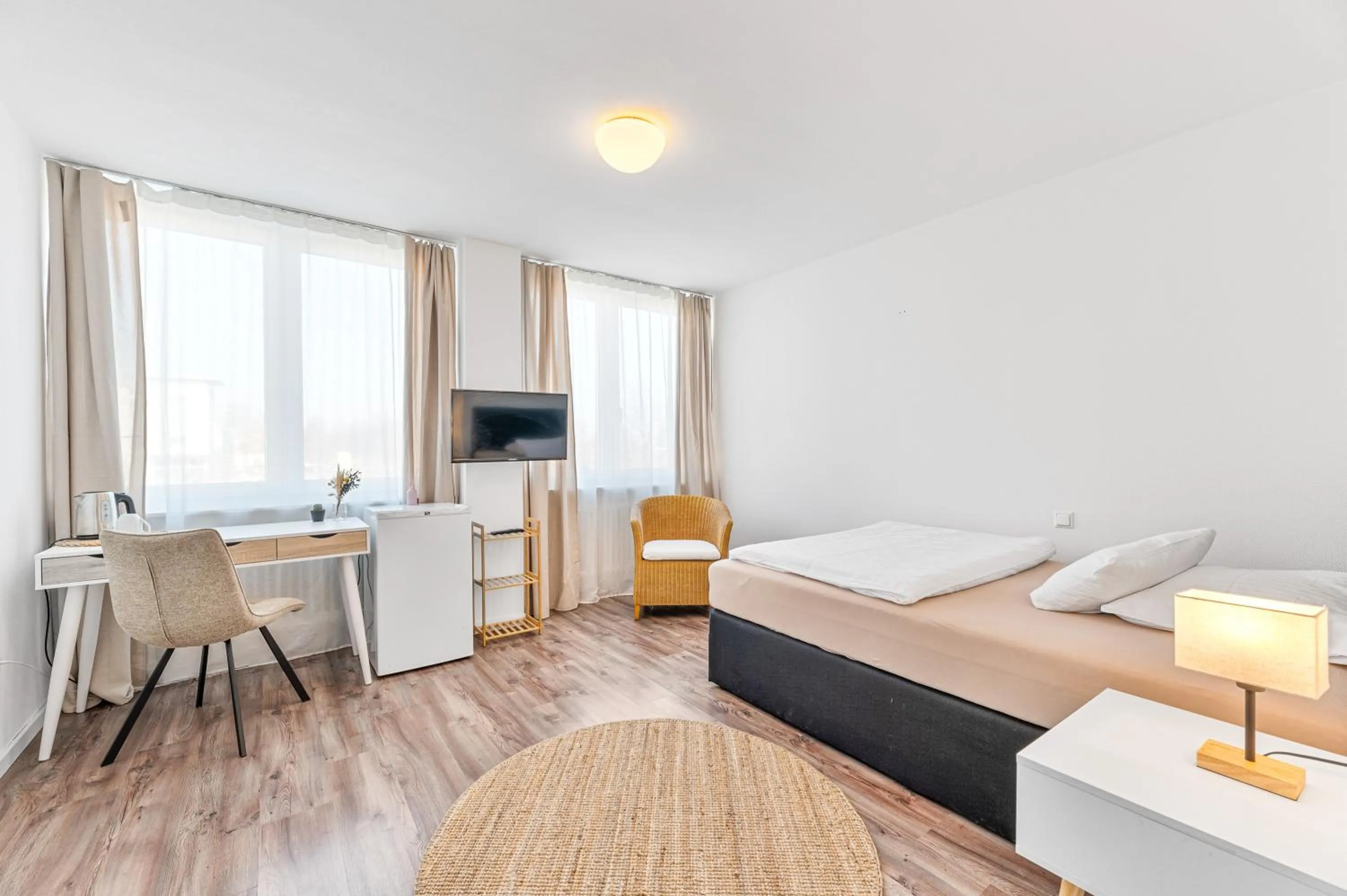 Communal lounge/ TV room, Bed in Atelier Guesthouse