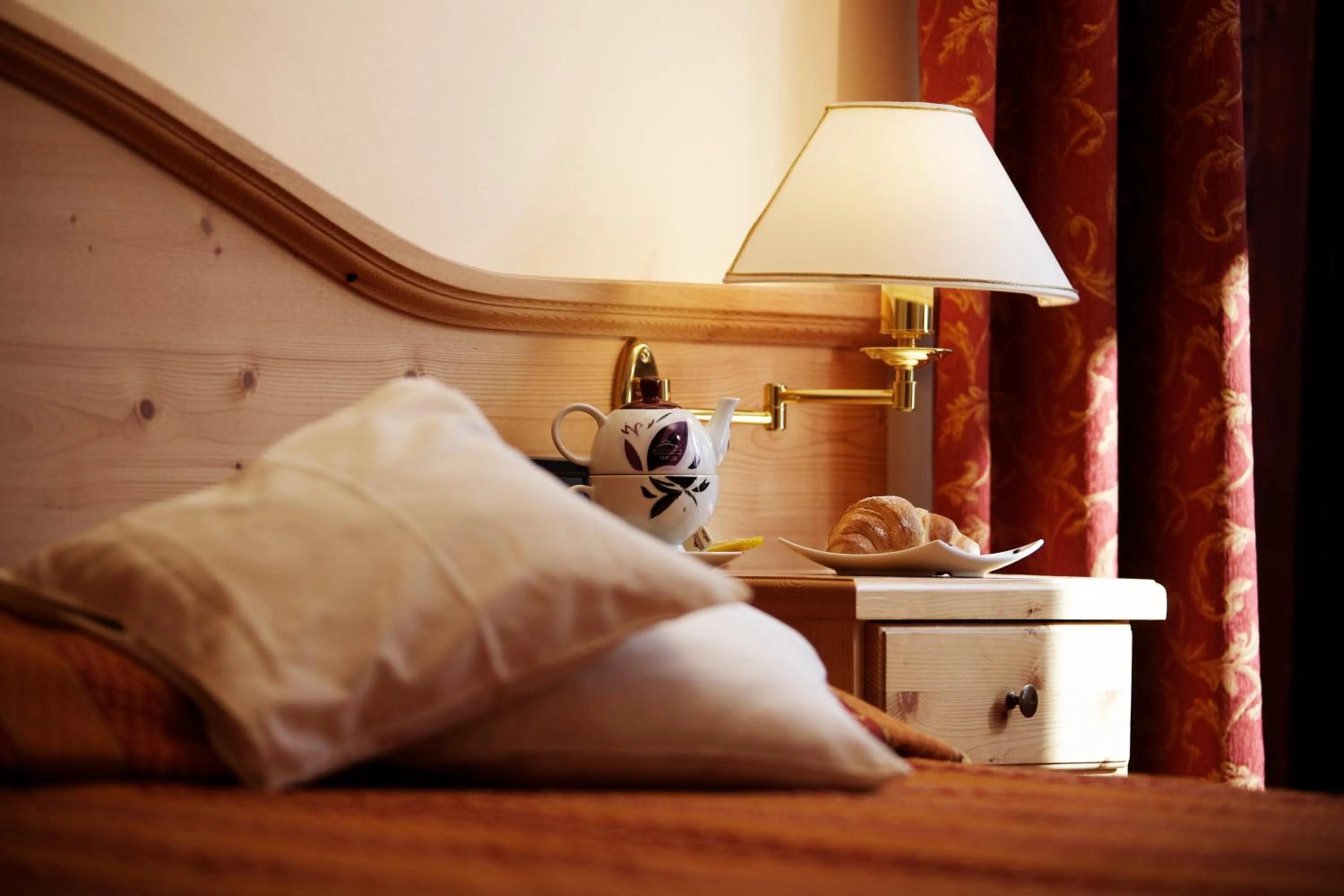 Decorative detail, Bed in Hotel Caminetto