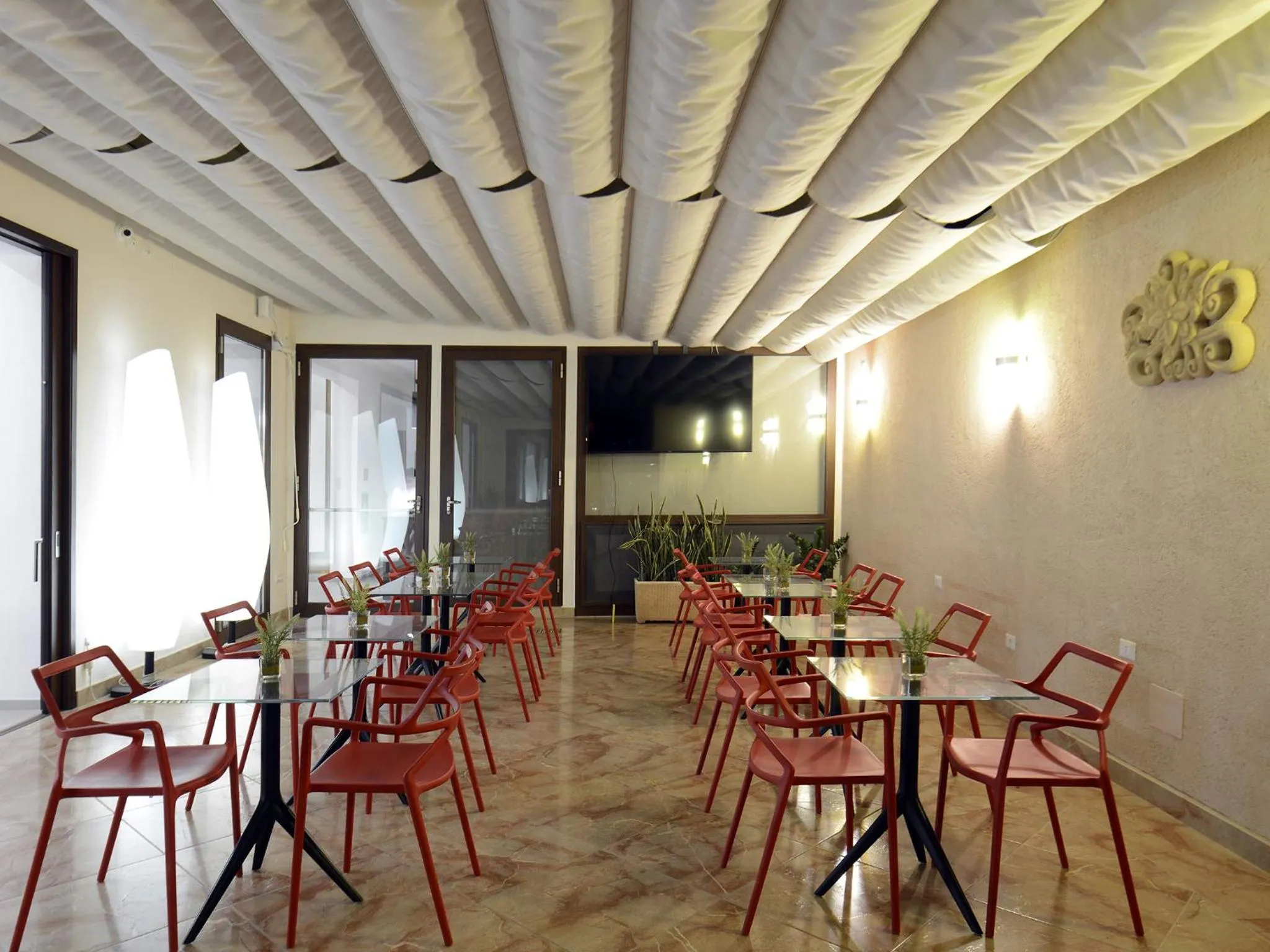 Communal lounge/ TV room in Best Western Hotel Martello