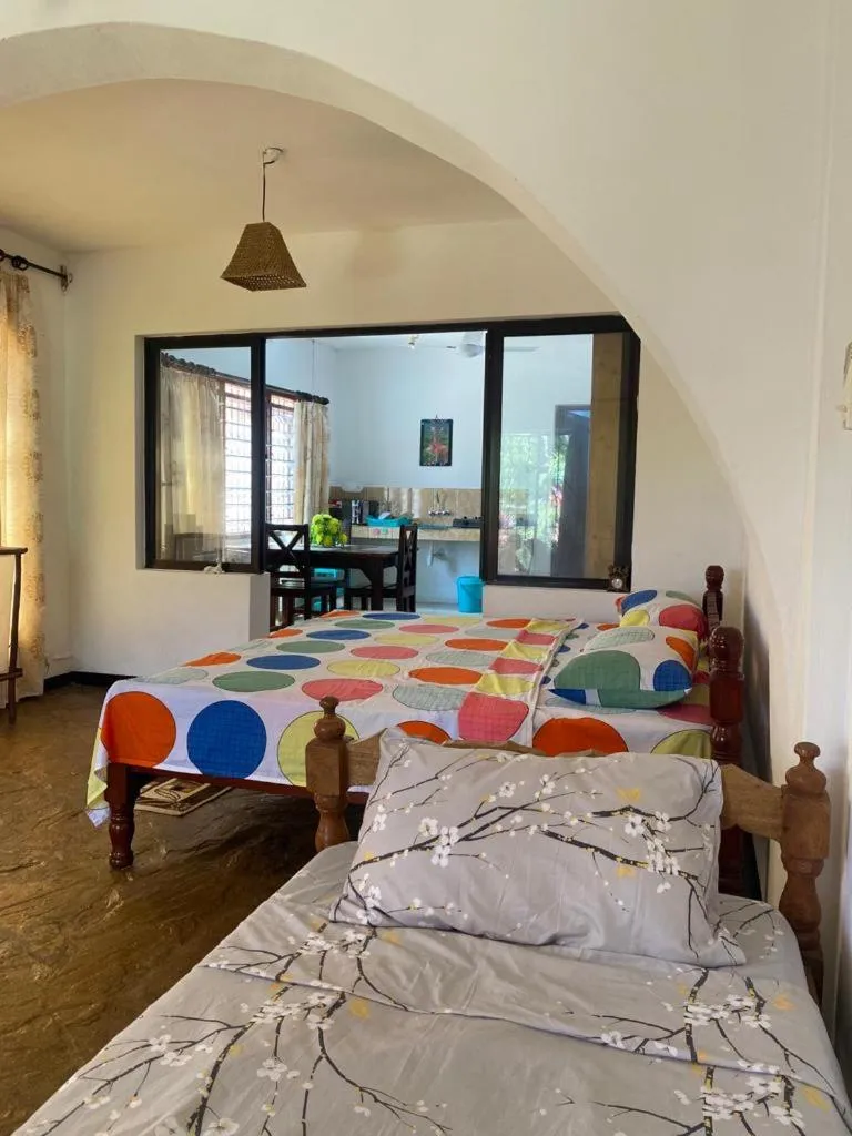 Bed in Tradewinds Lodge