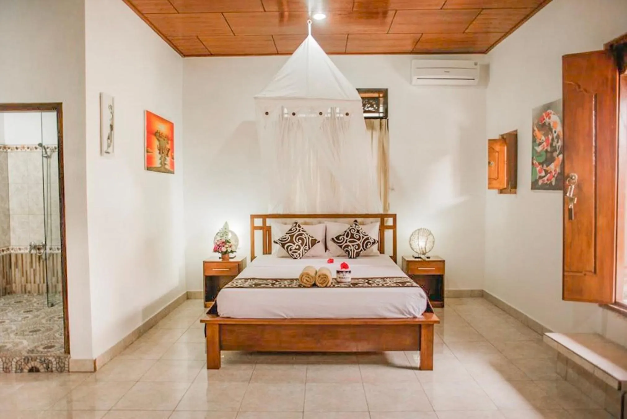 Bed in Artha Dewata Home Stay