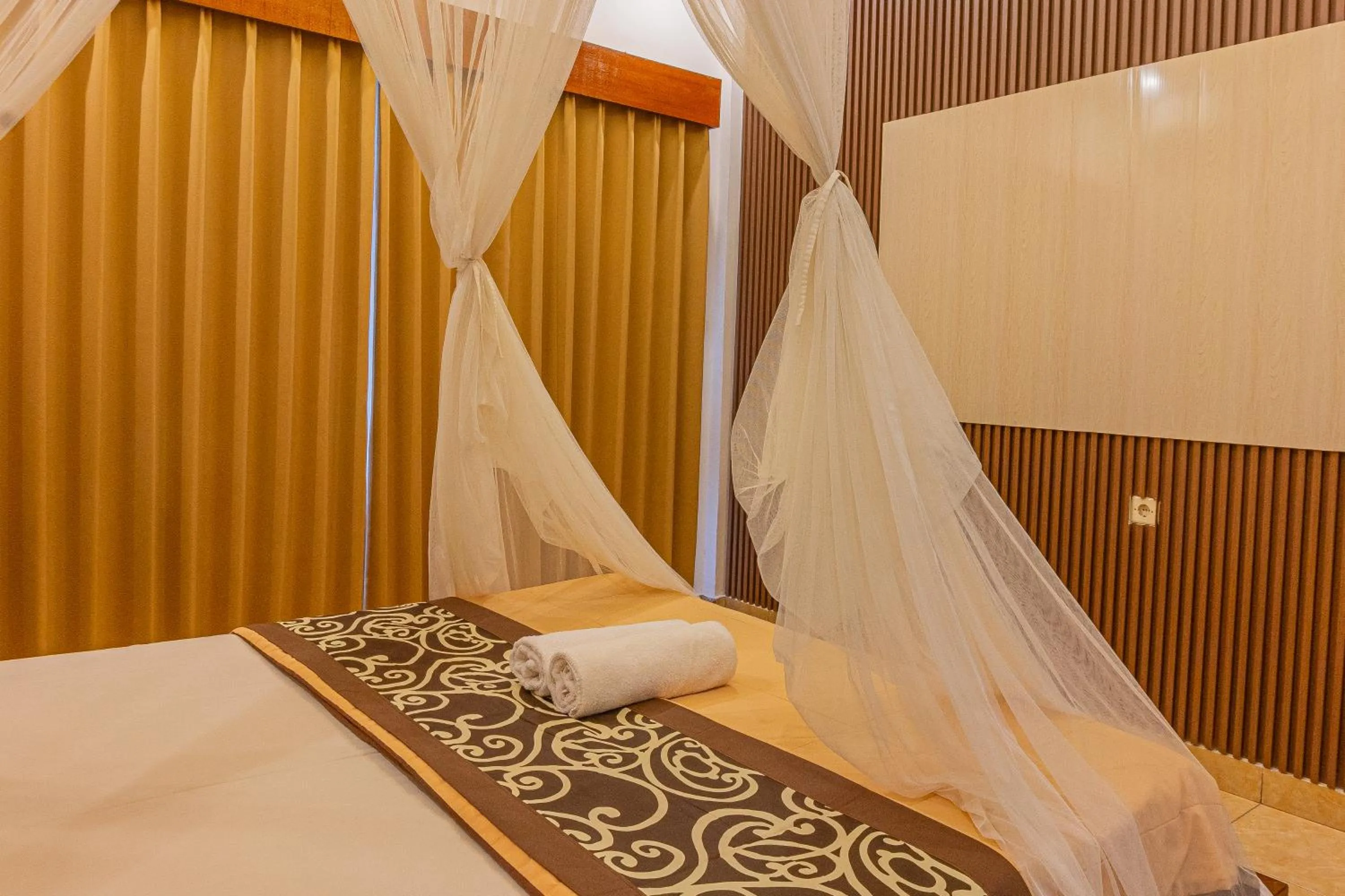 Bed in Artha Dewata Home Stay
