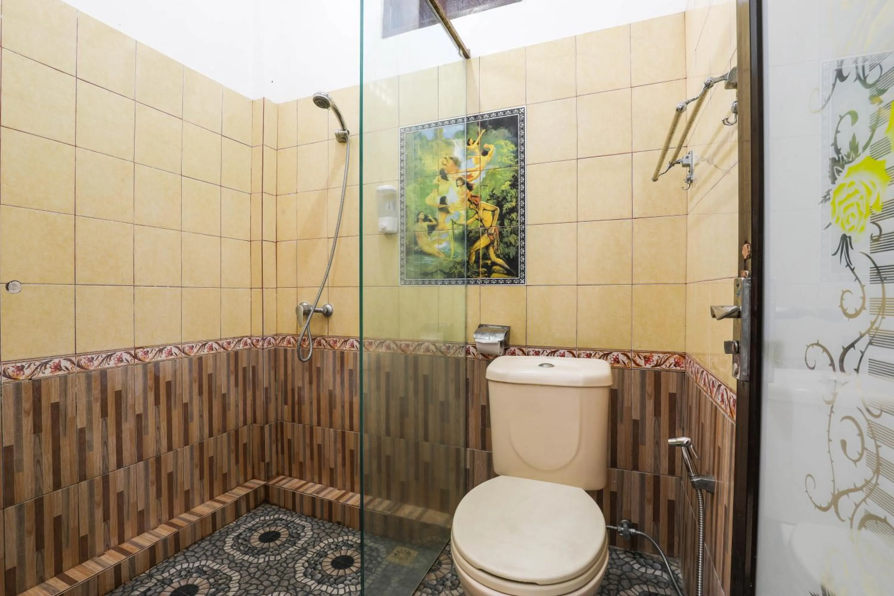 Toilet in Artha Dewata Home Stay