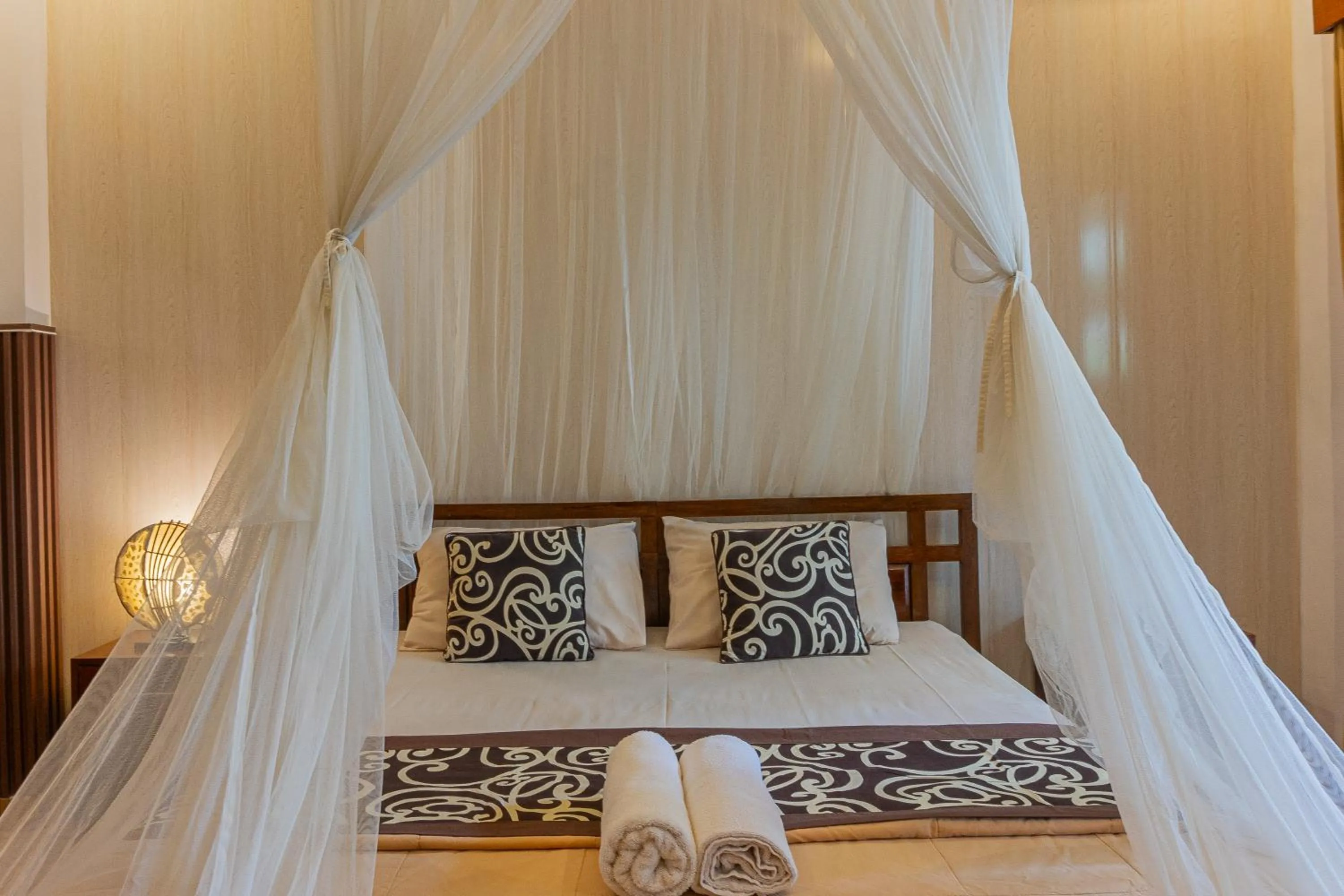 Bed in Artha Dewata Home Stay