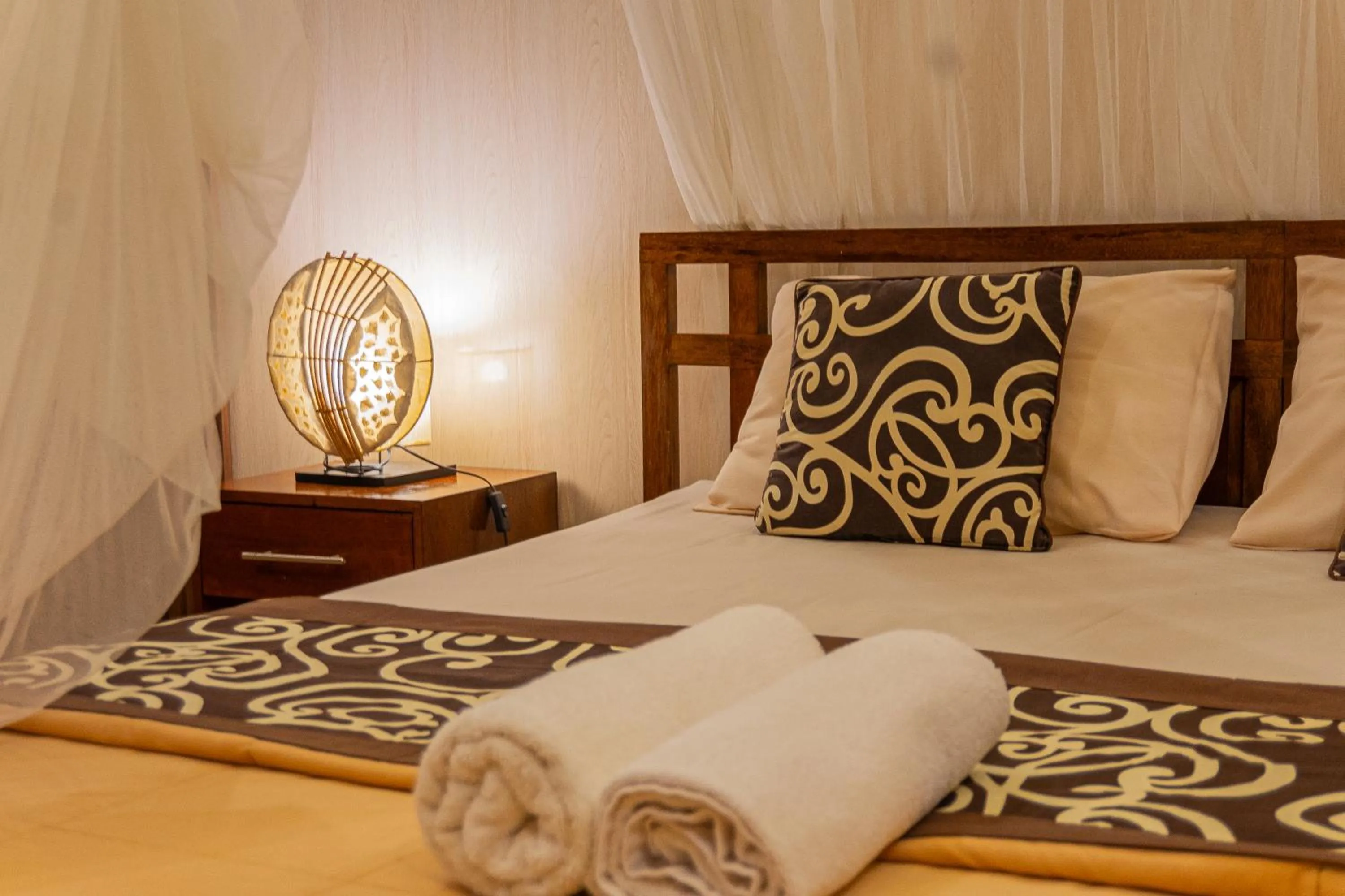 Bed in Artha Dewata Home Stay