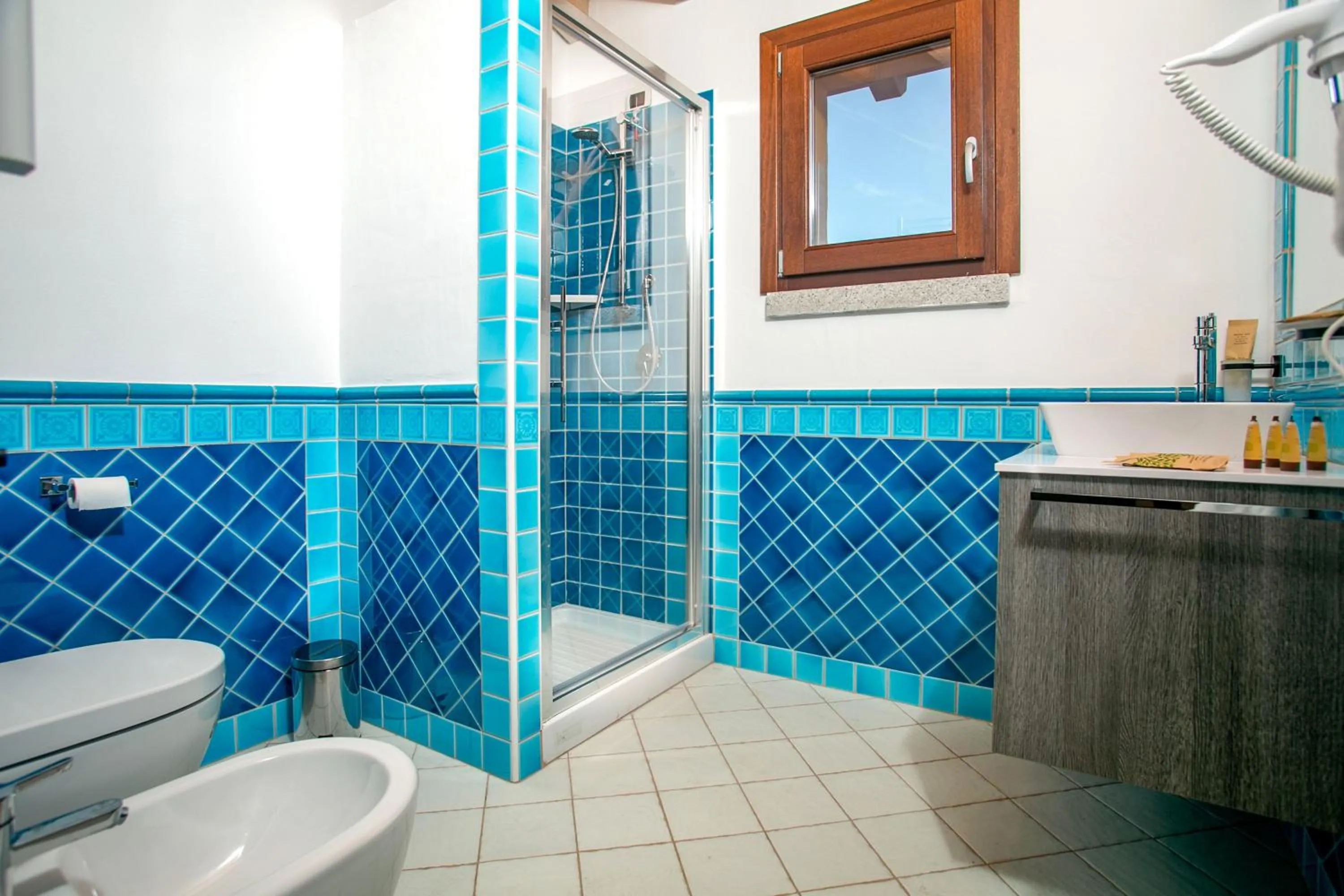 Bathroom in Punta Falcone Resort