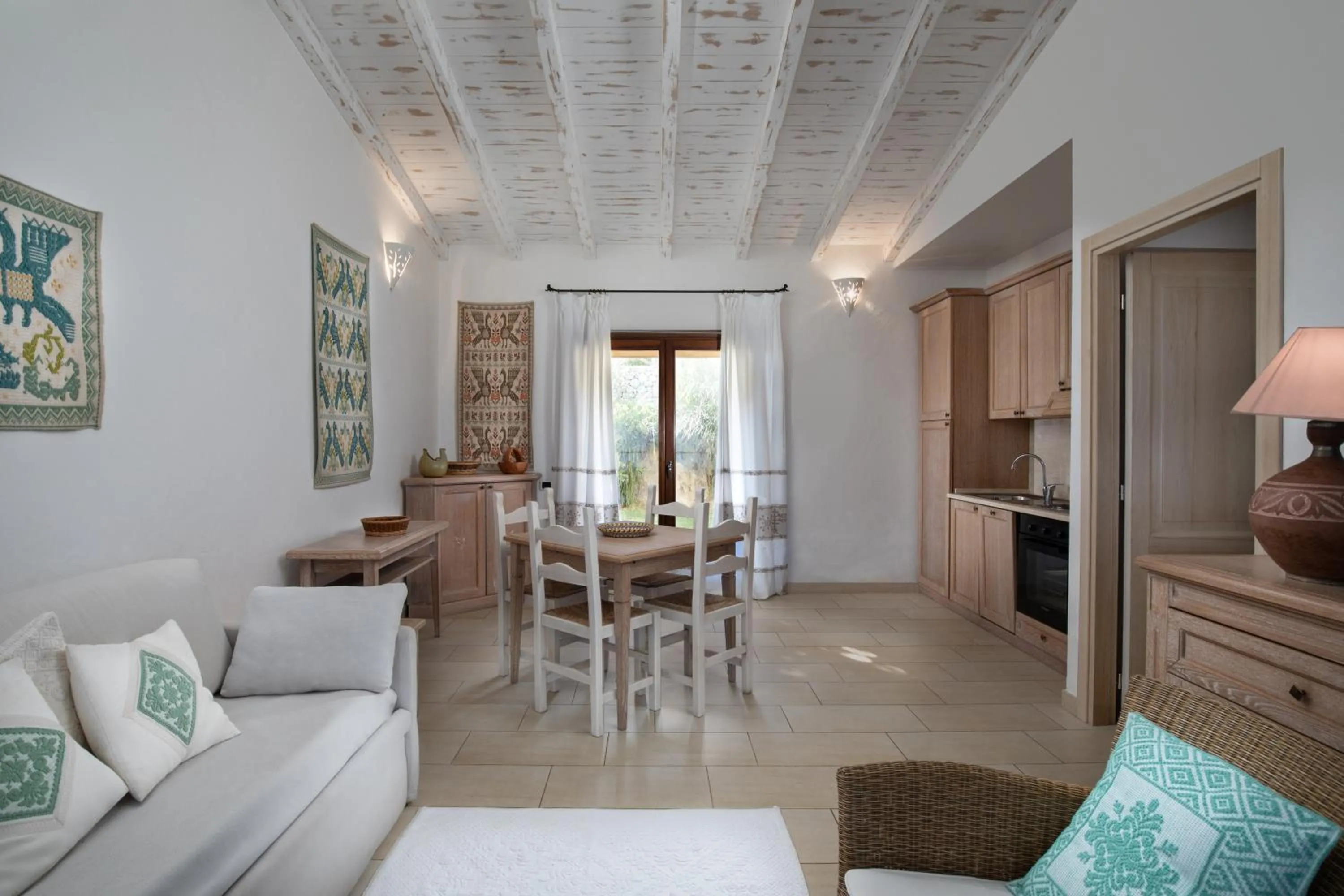 Kitchen or kitchenette in Punta Falcone Resort