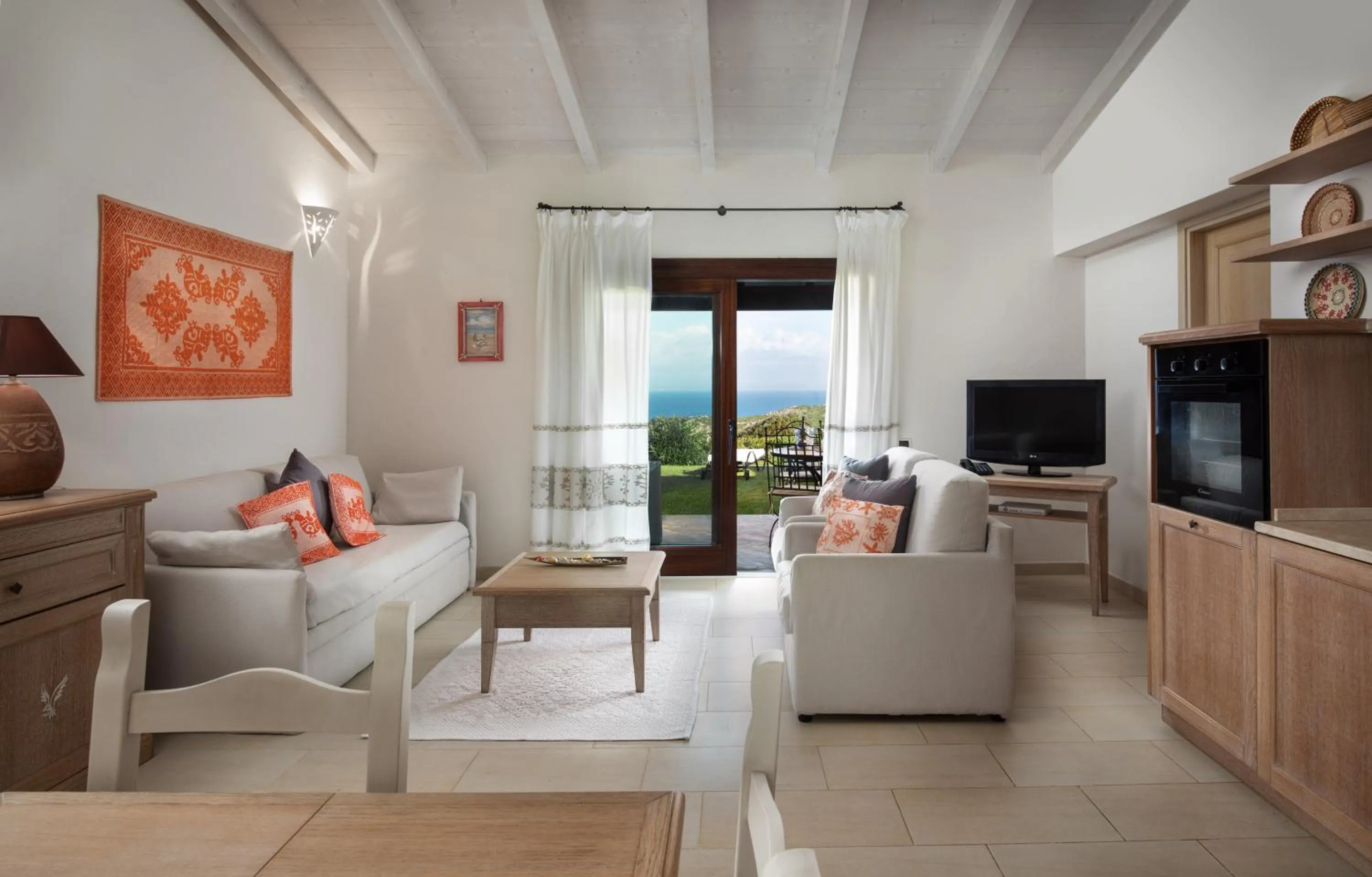 Living room in Punta Falcone Resort