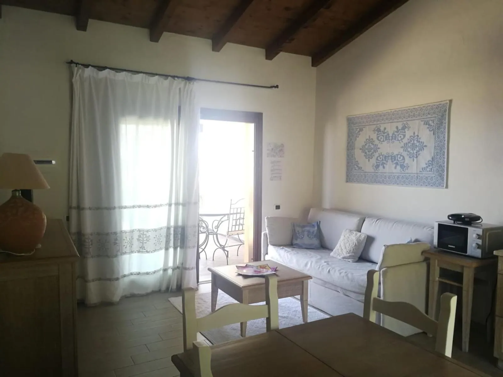 Living room in Punta Falcone Resort
