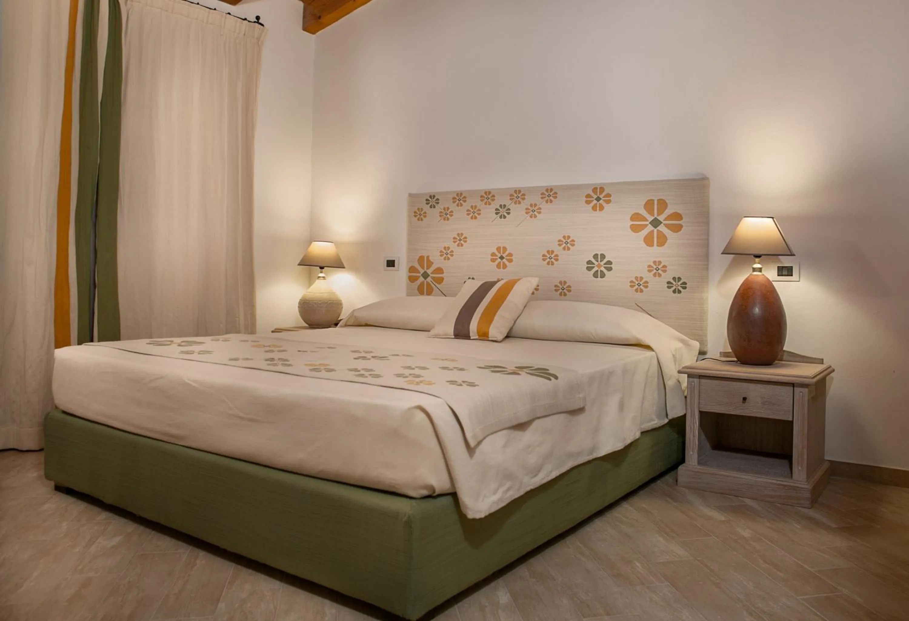 Bedroom, Bed in Punta Falcone Resort