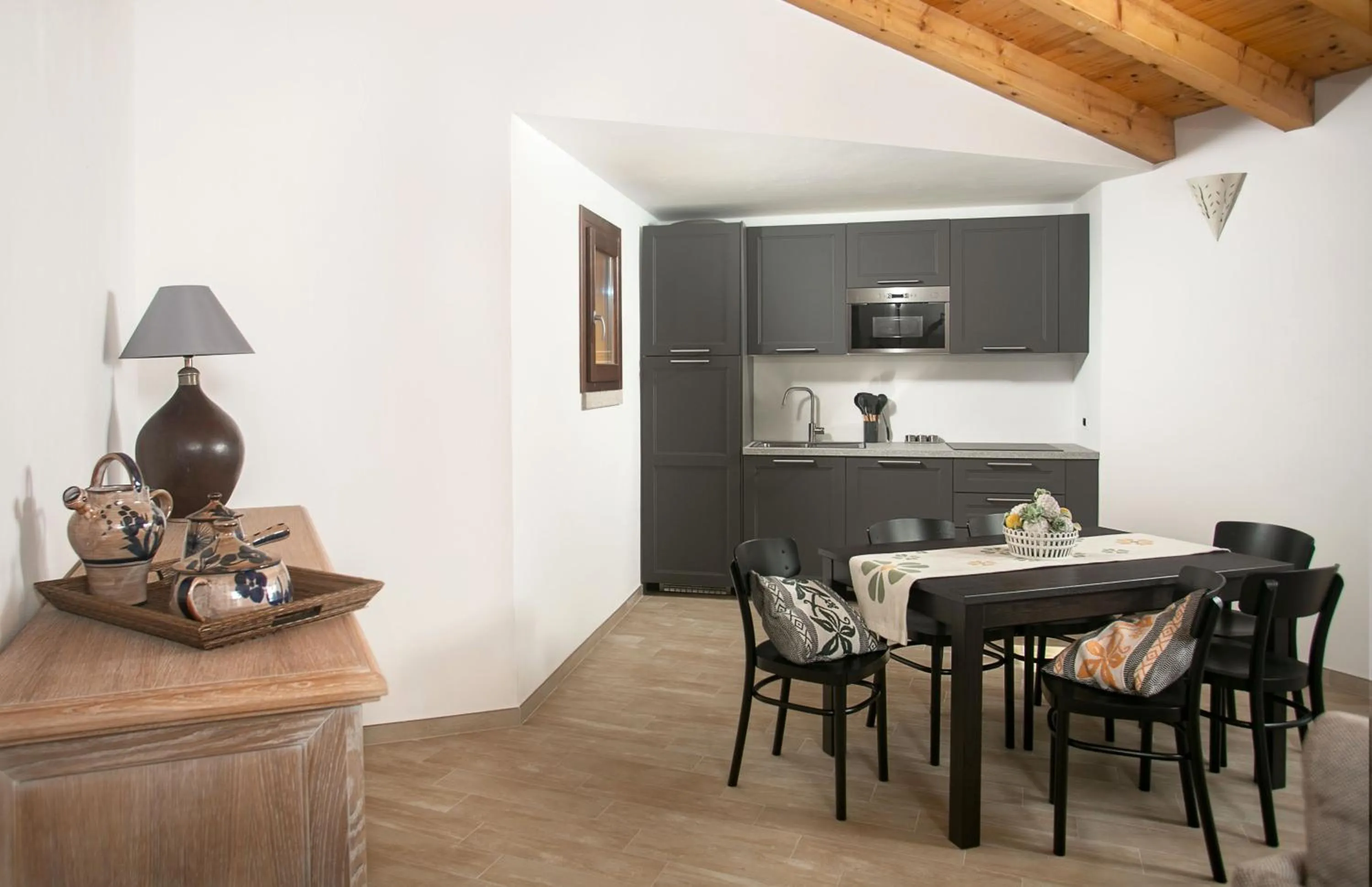 Kitchen or kitchenette in Punta Falcone Resort