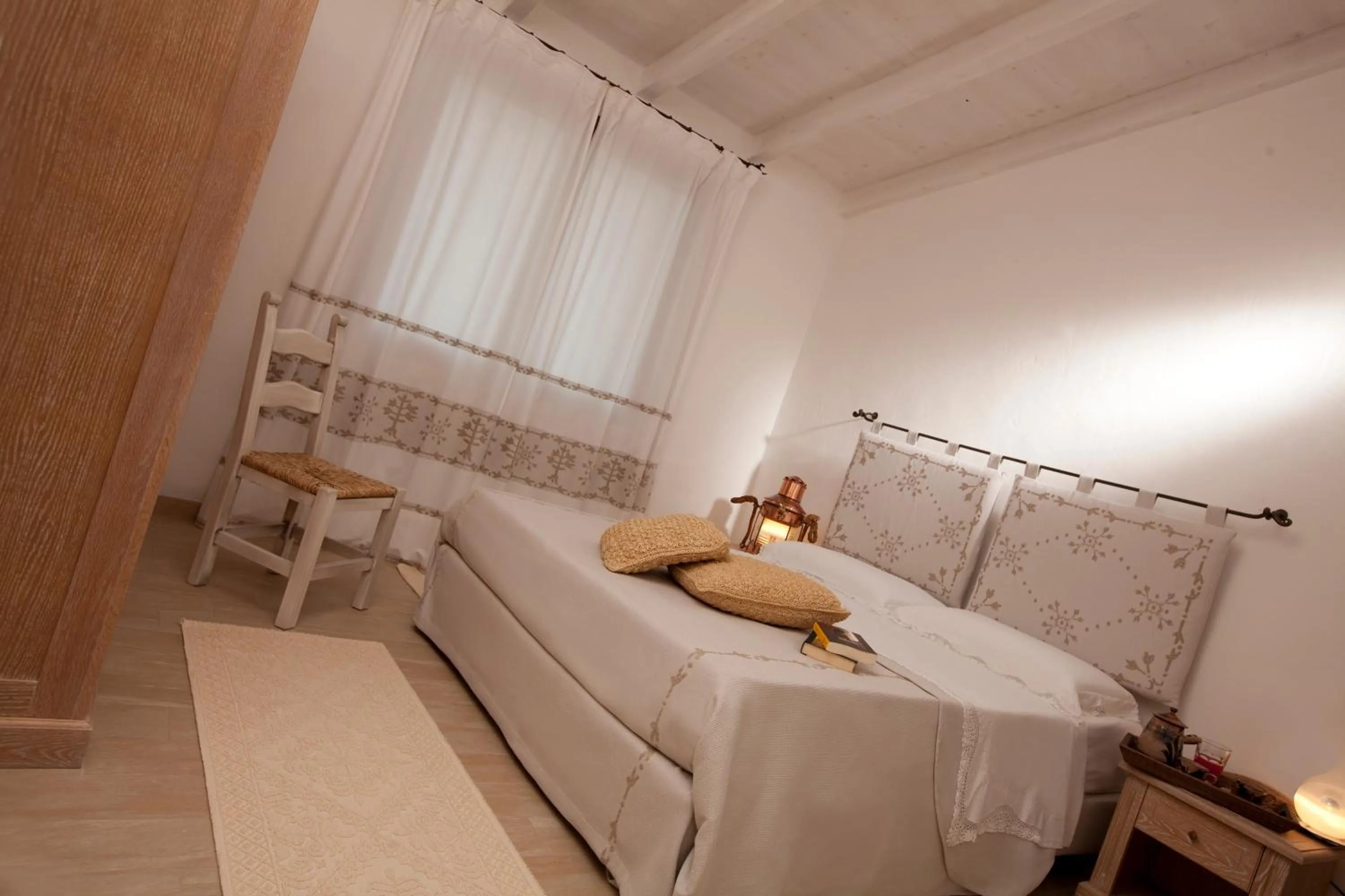 Photo of the whole room, Bed in Punta Falcone Resort