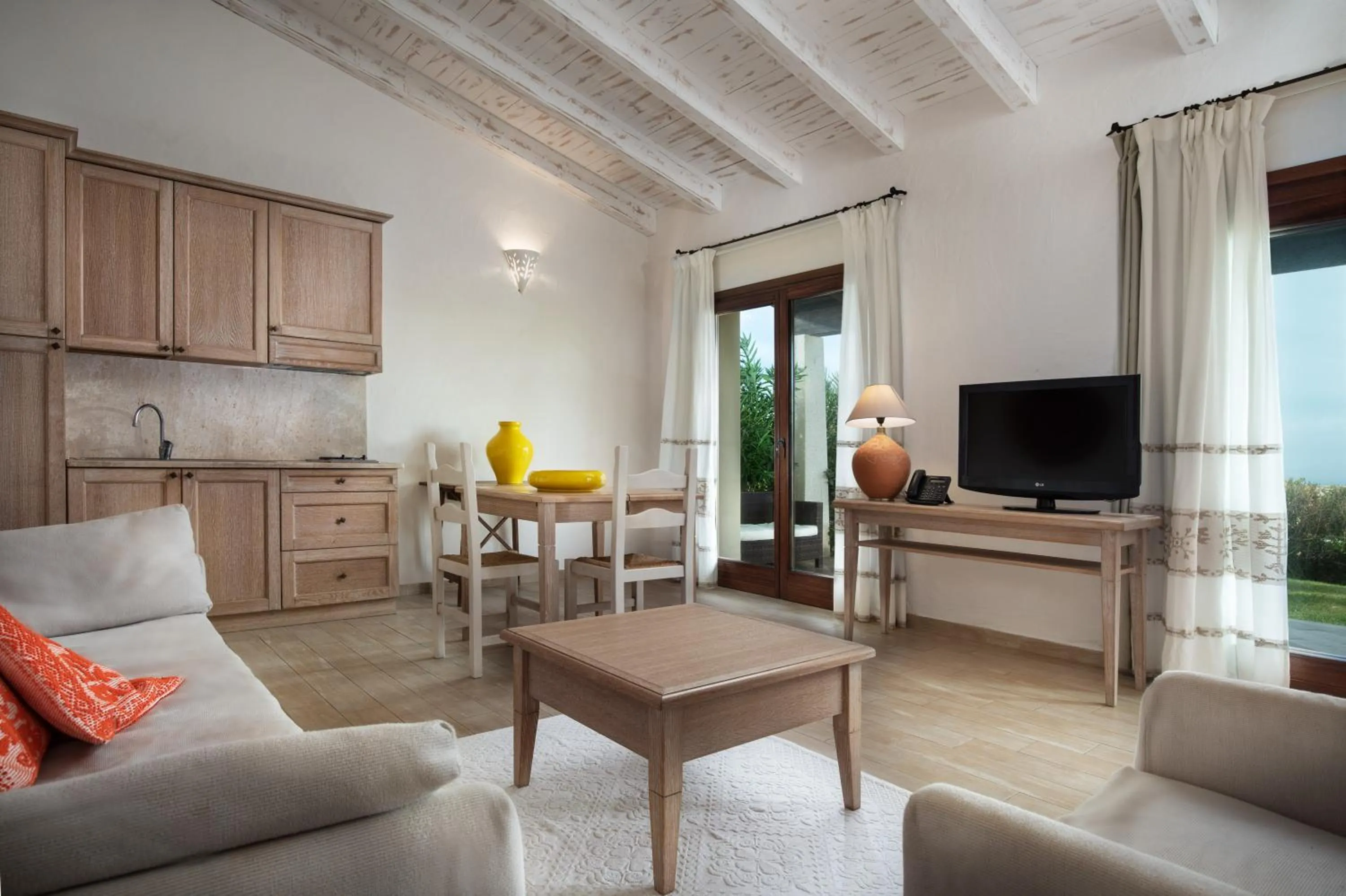 Kitchen or kitchenette in Punta Falcone Resort