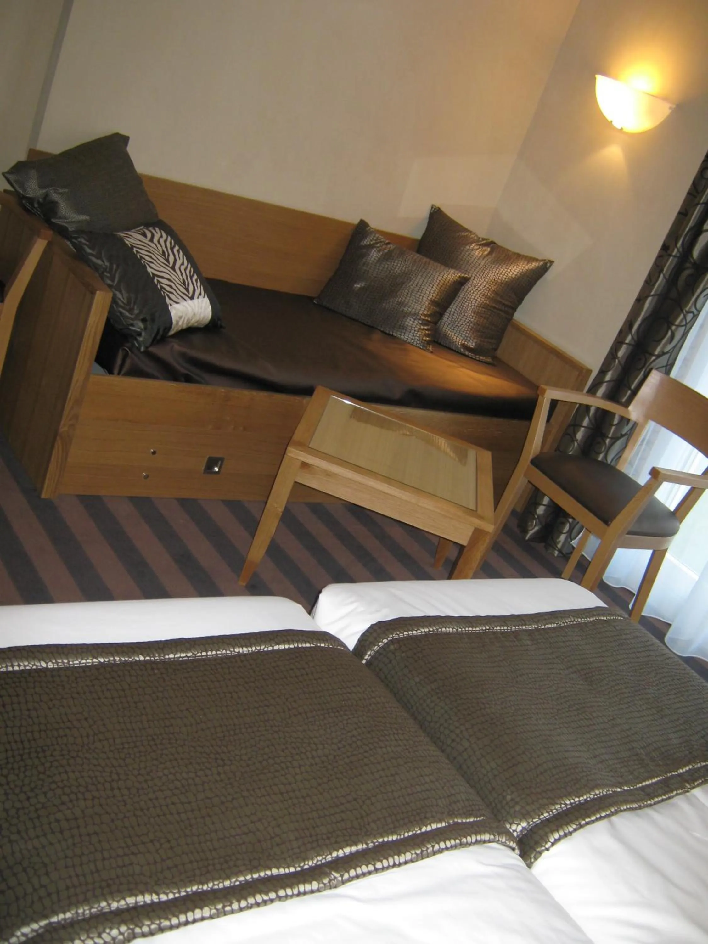 Decorative detail, Bed in Auberge Du Moulin Marin