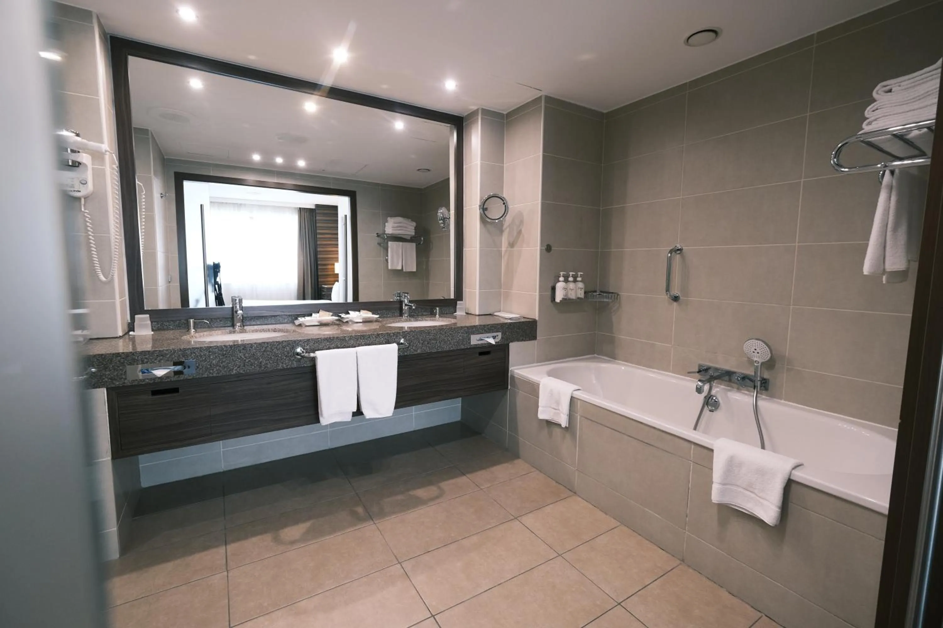 Bathroom in Holiday Inn Almaty by IHG