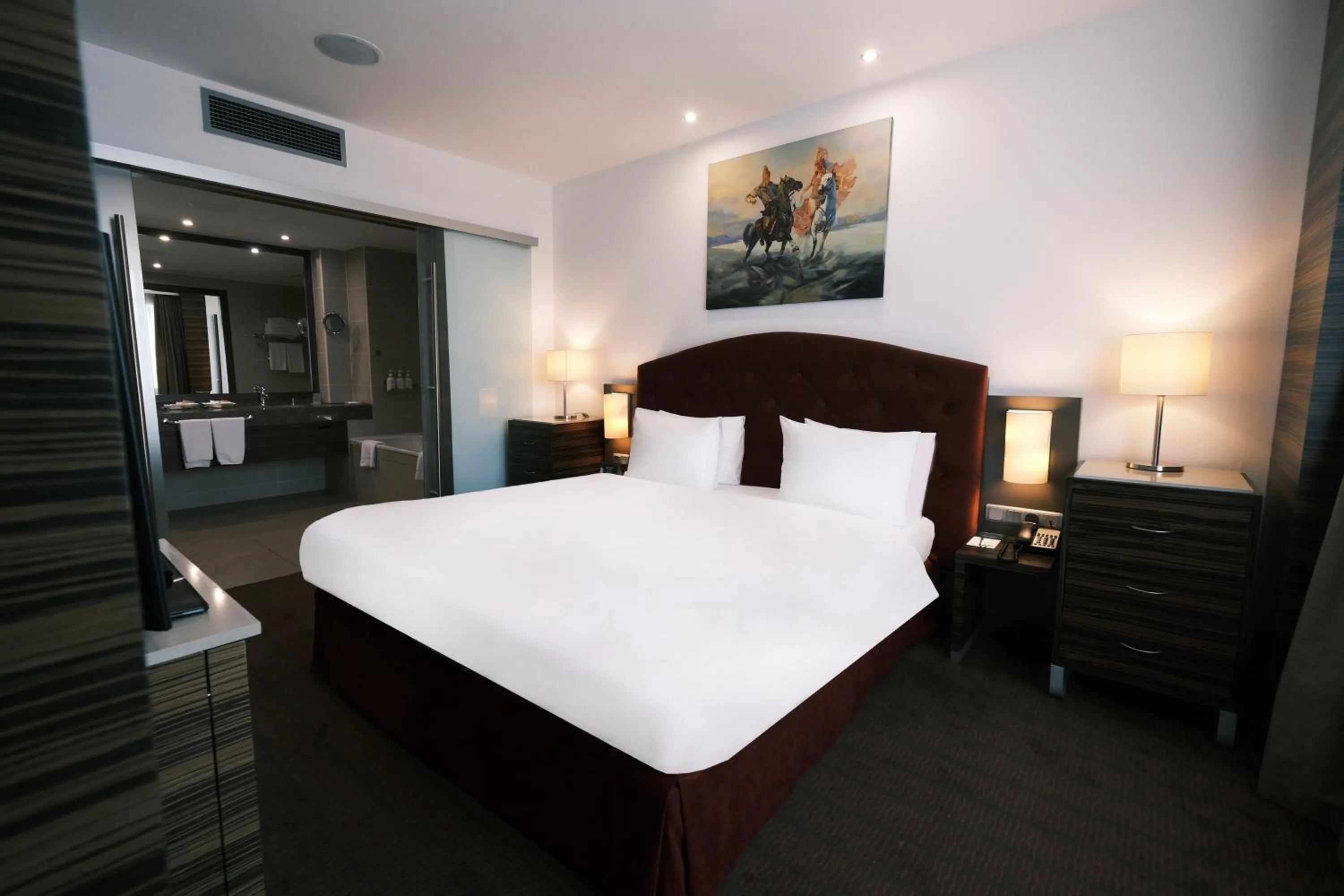 Photo of the whole room, Bed in Holiday Inn Almaty by IHG