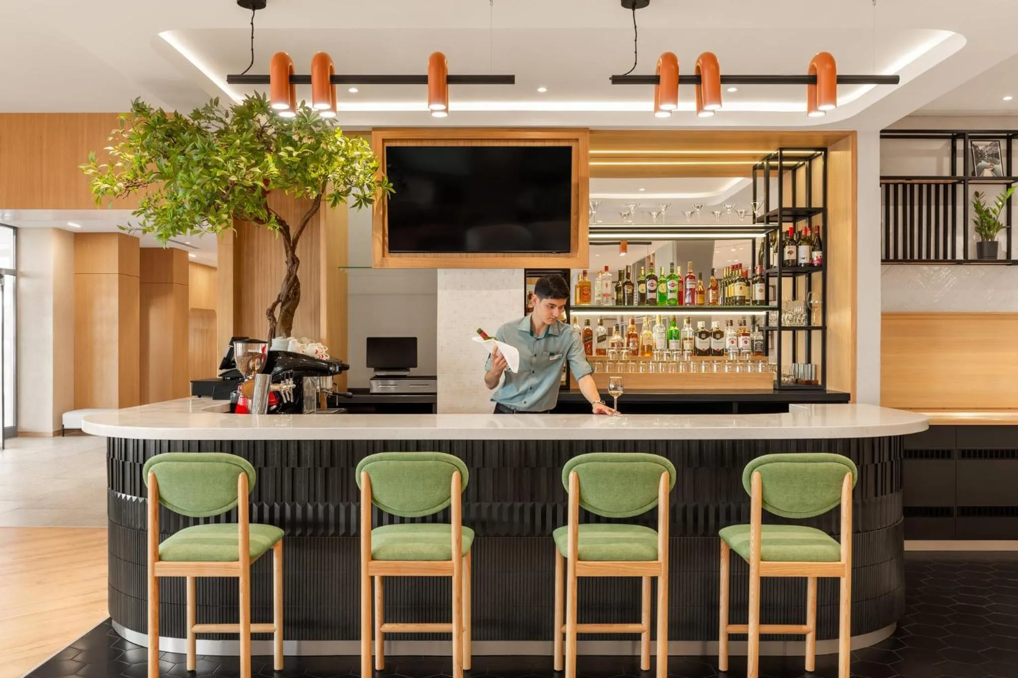 Lounge or bar in Holiday Inn Almaty by IHG
