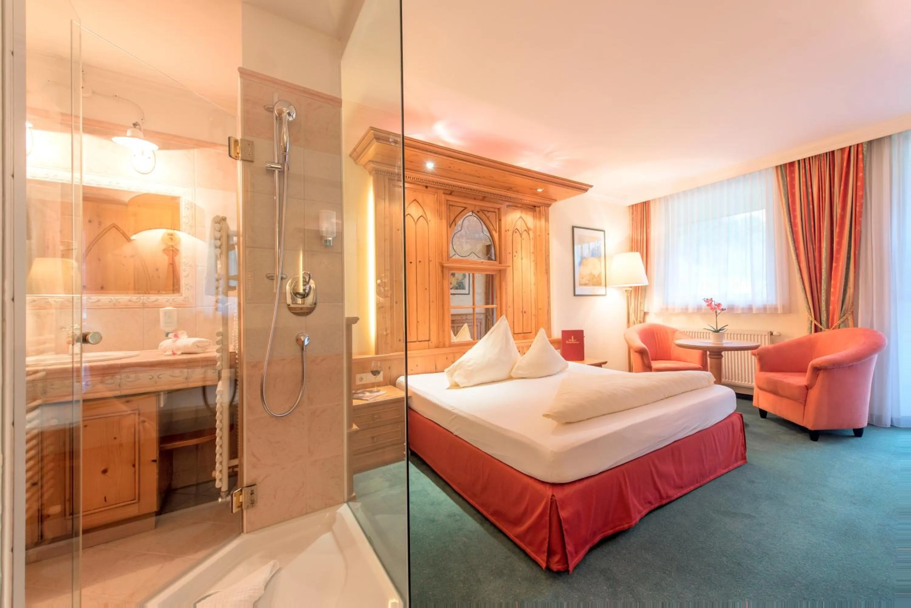 Bathroom, Bed in Hotel Vitalquelle Montafon