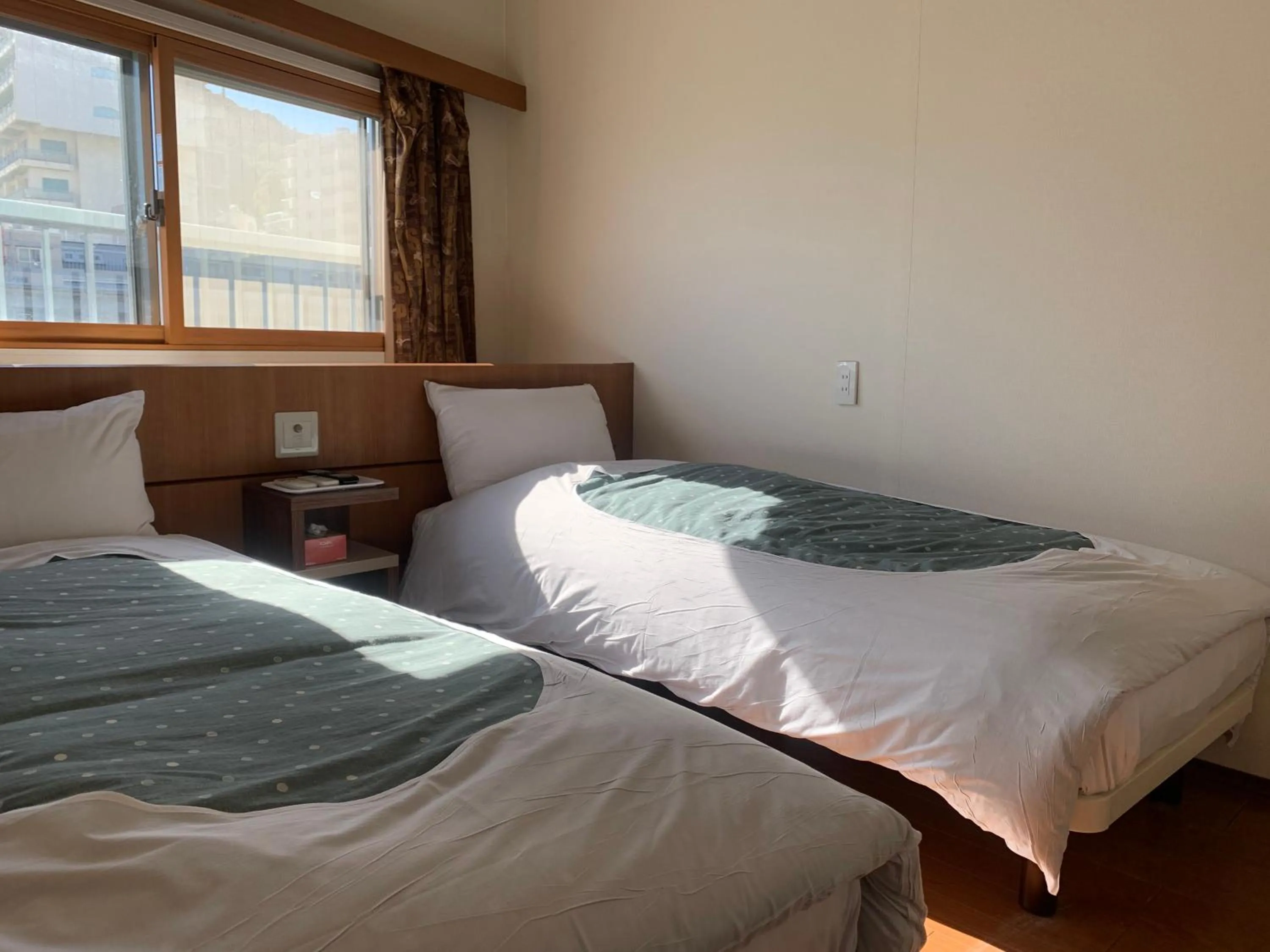 Bed in Izu-no-umi Hotel