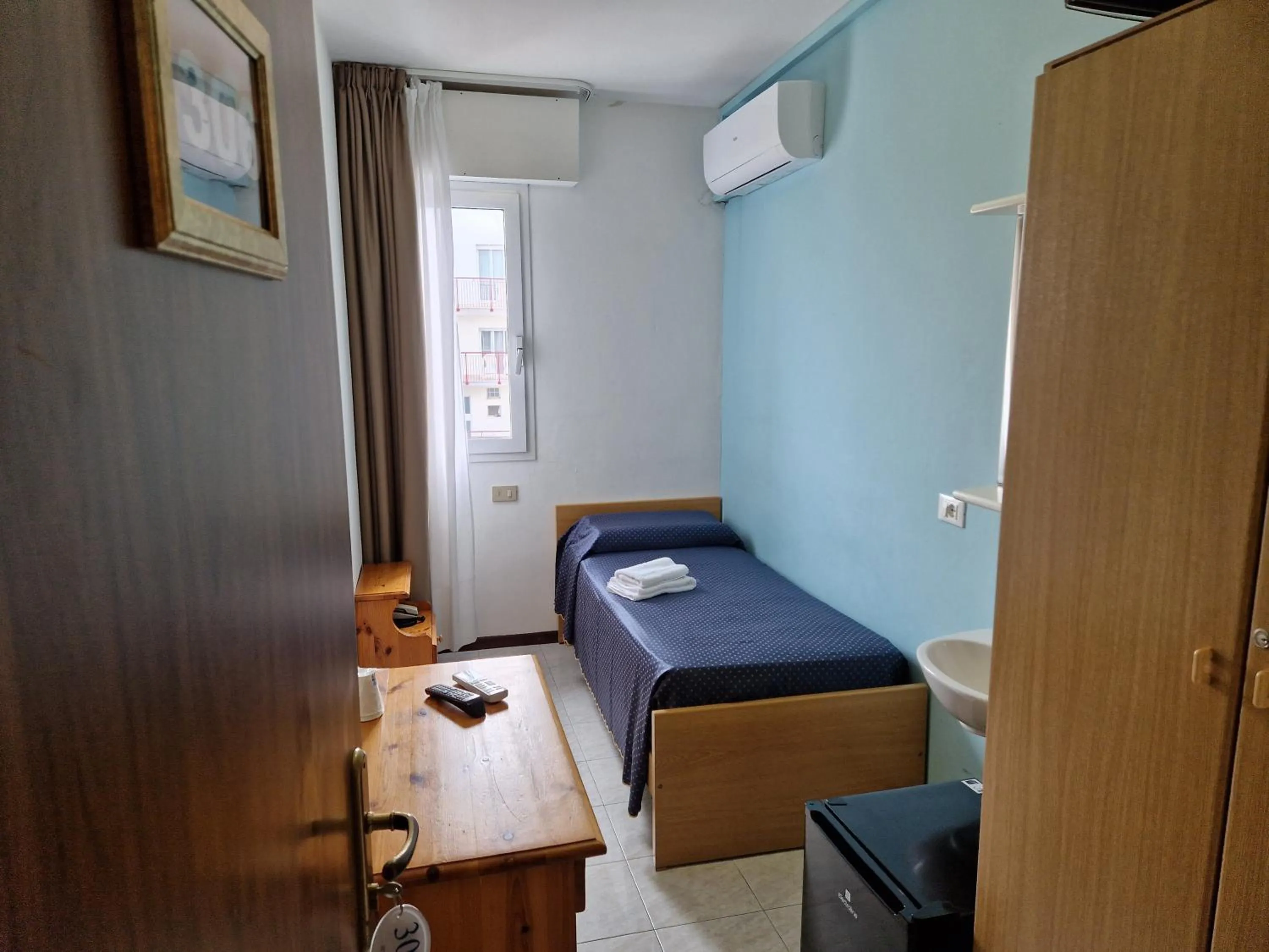 Bed in Hotel Danubio