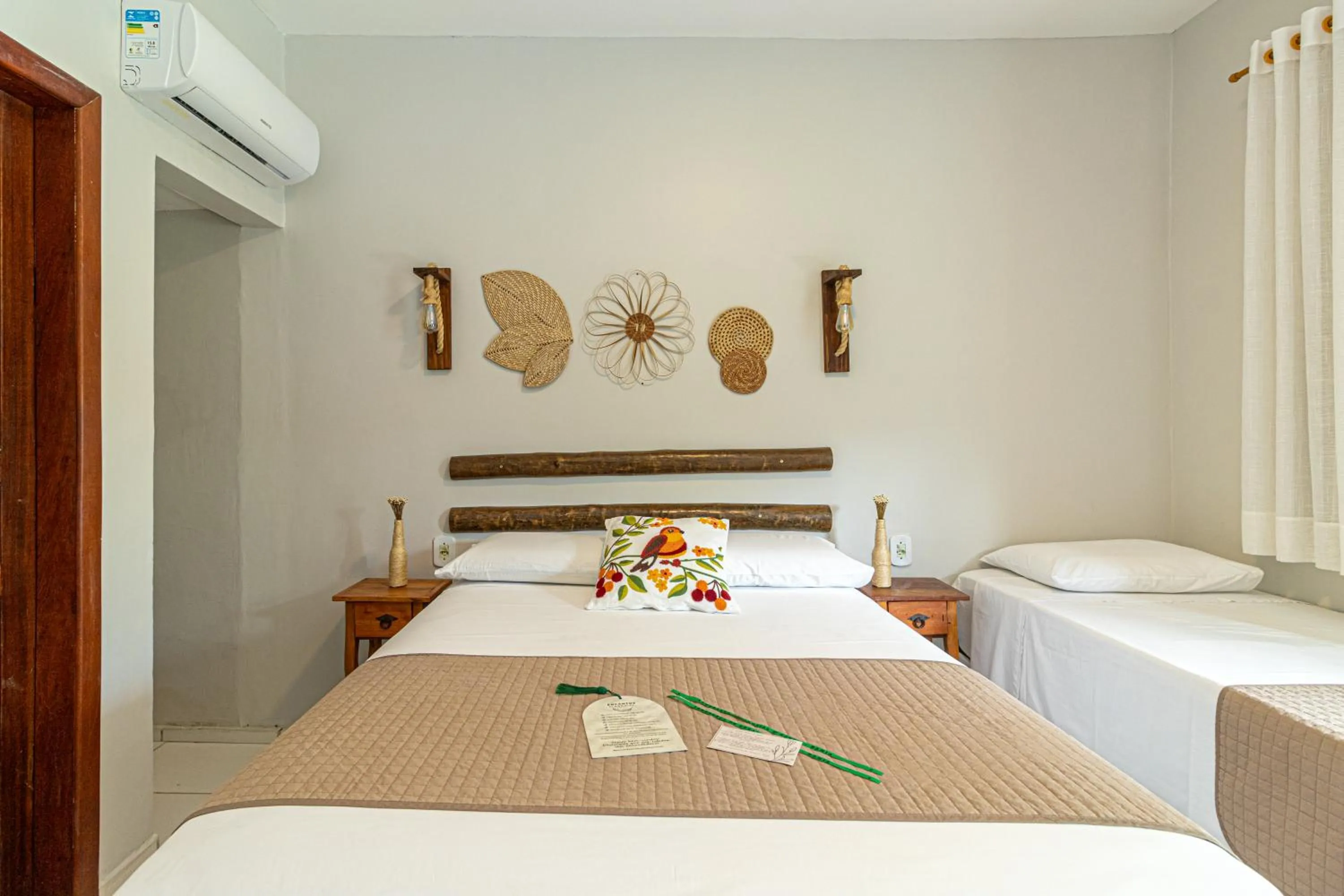 Bed in Pousada Encantos de Arraial