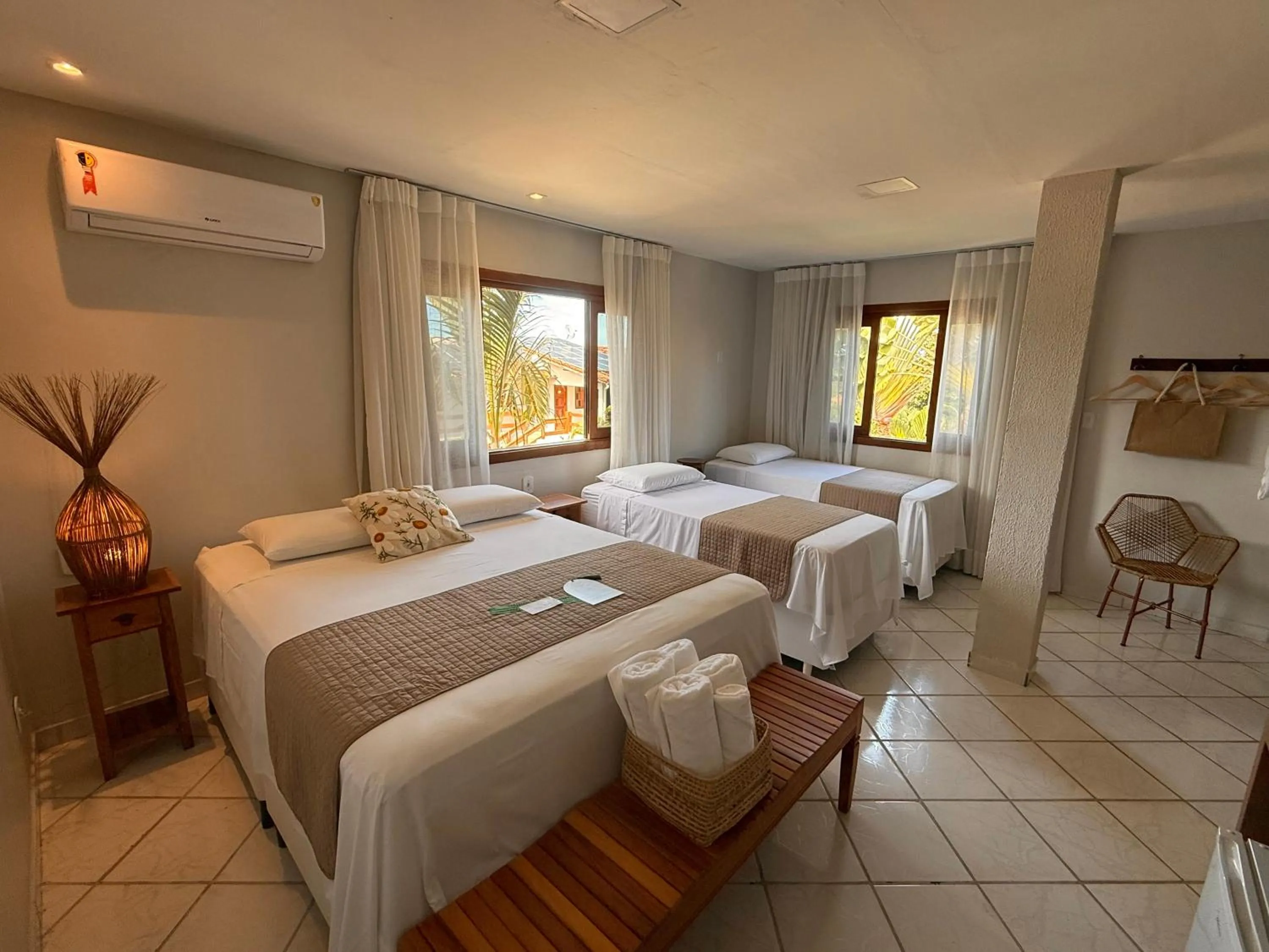 Bed in Pousada Encantos de Arraial