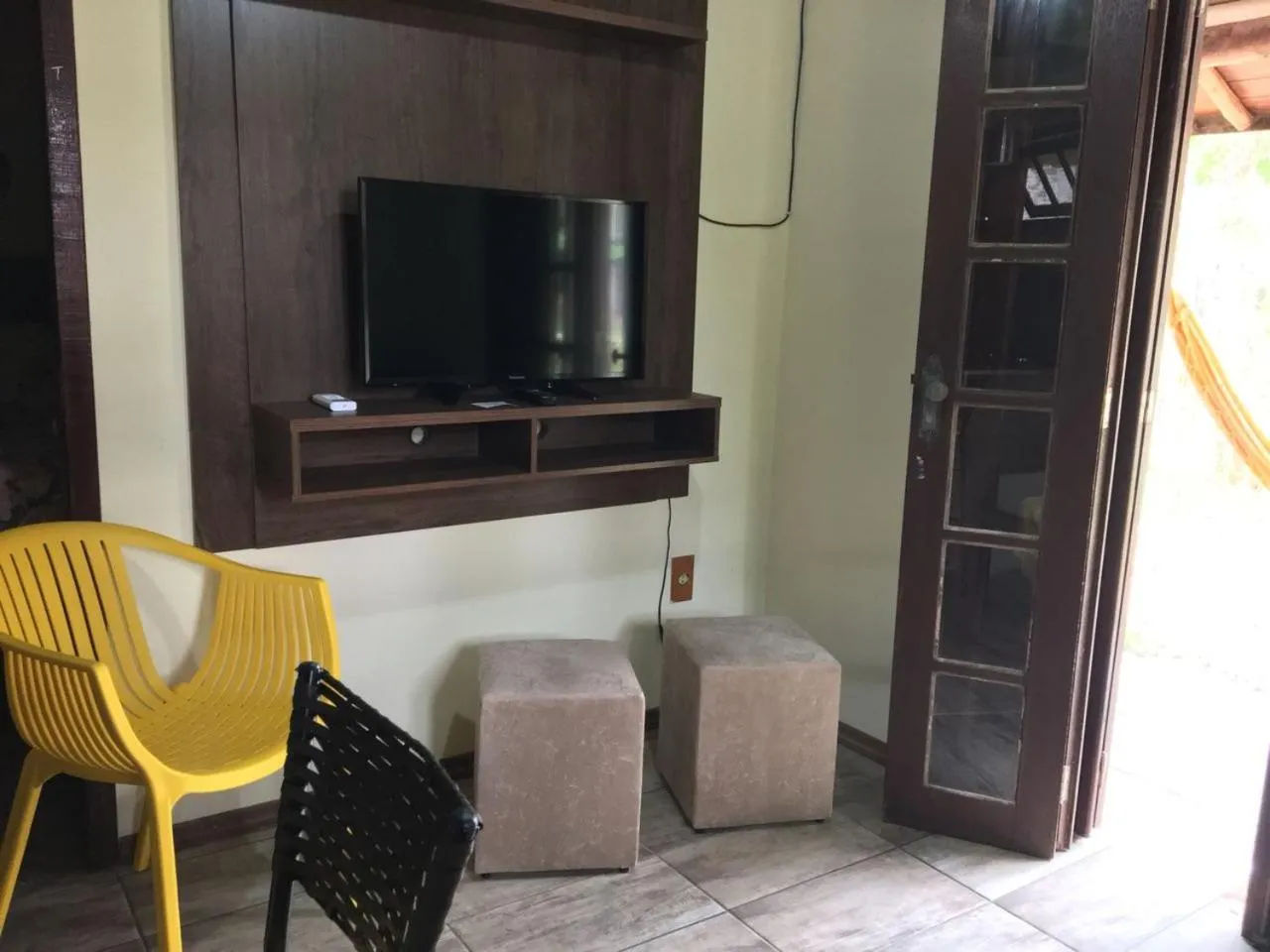 Communal lounge/ TV room in Hotel Praia Do Rosa