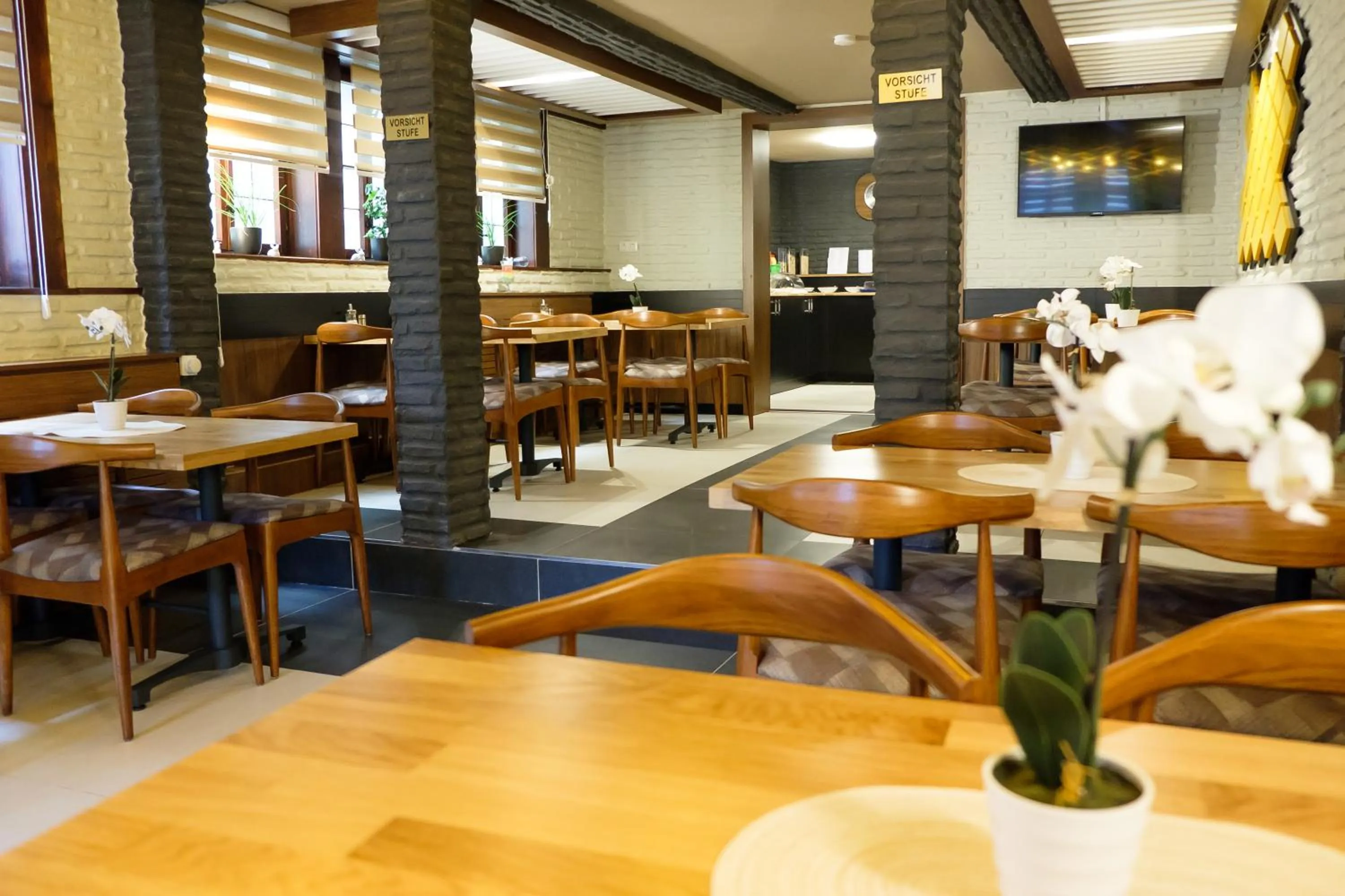 Communal lounge/ TV room in Hotel im Anker