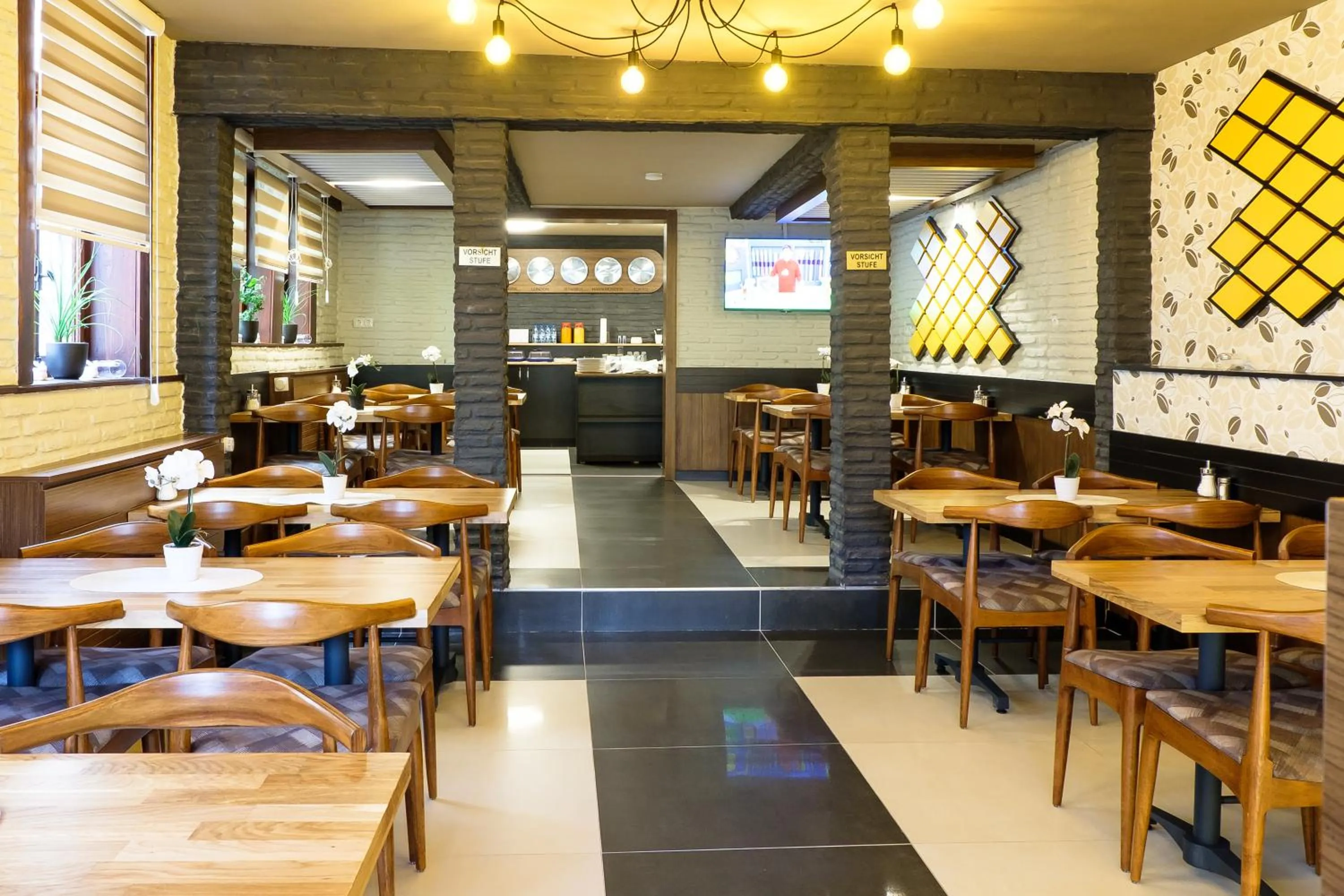 Communal lounge/ TV room in Hotel im Anker