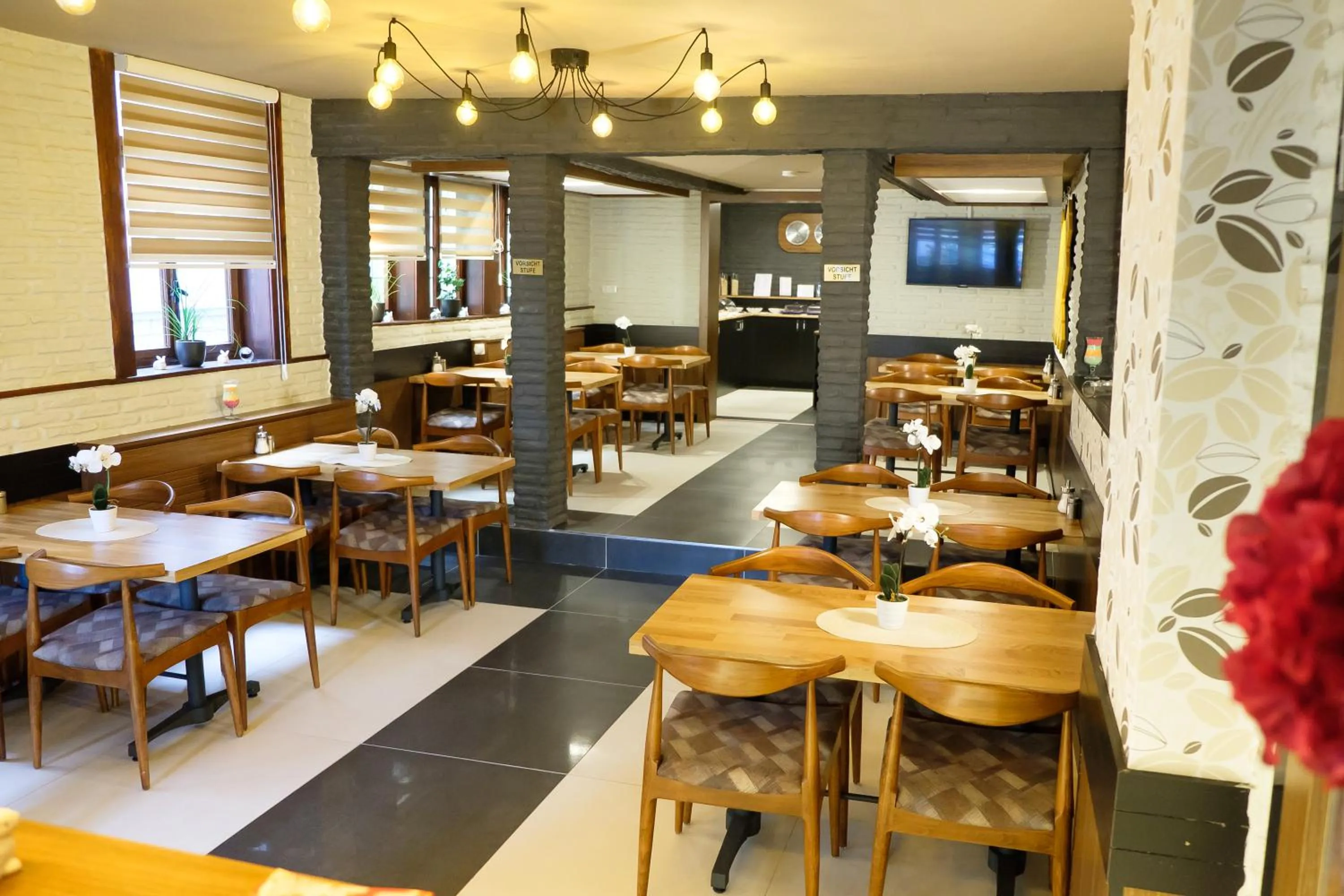 Communal lounge/ TV room in Hotel im Anker