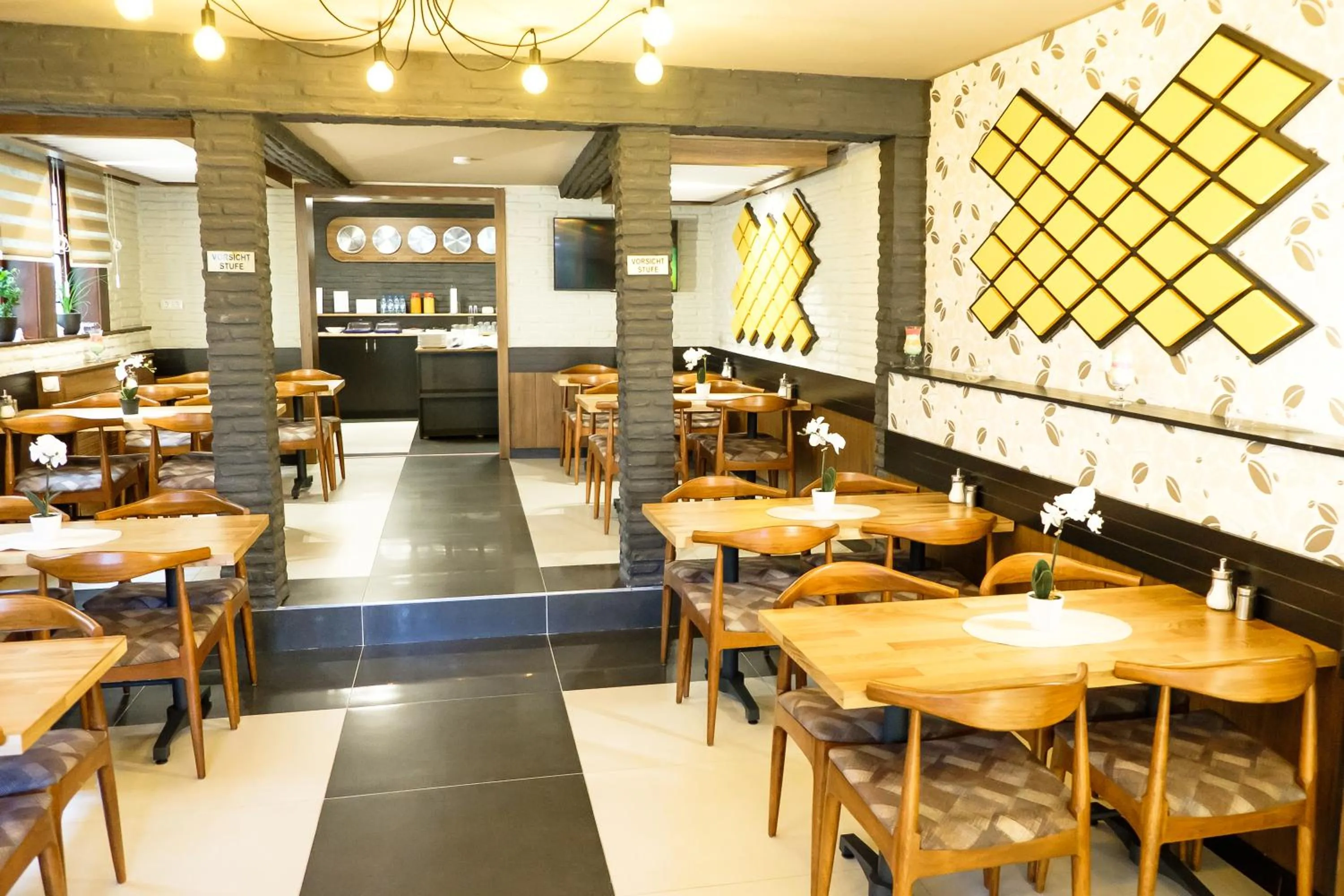 Communal lounge/ TV room in Hotel im Anker