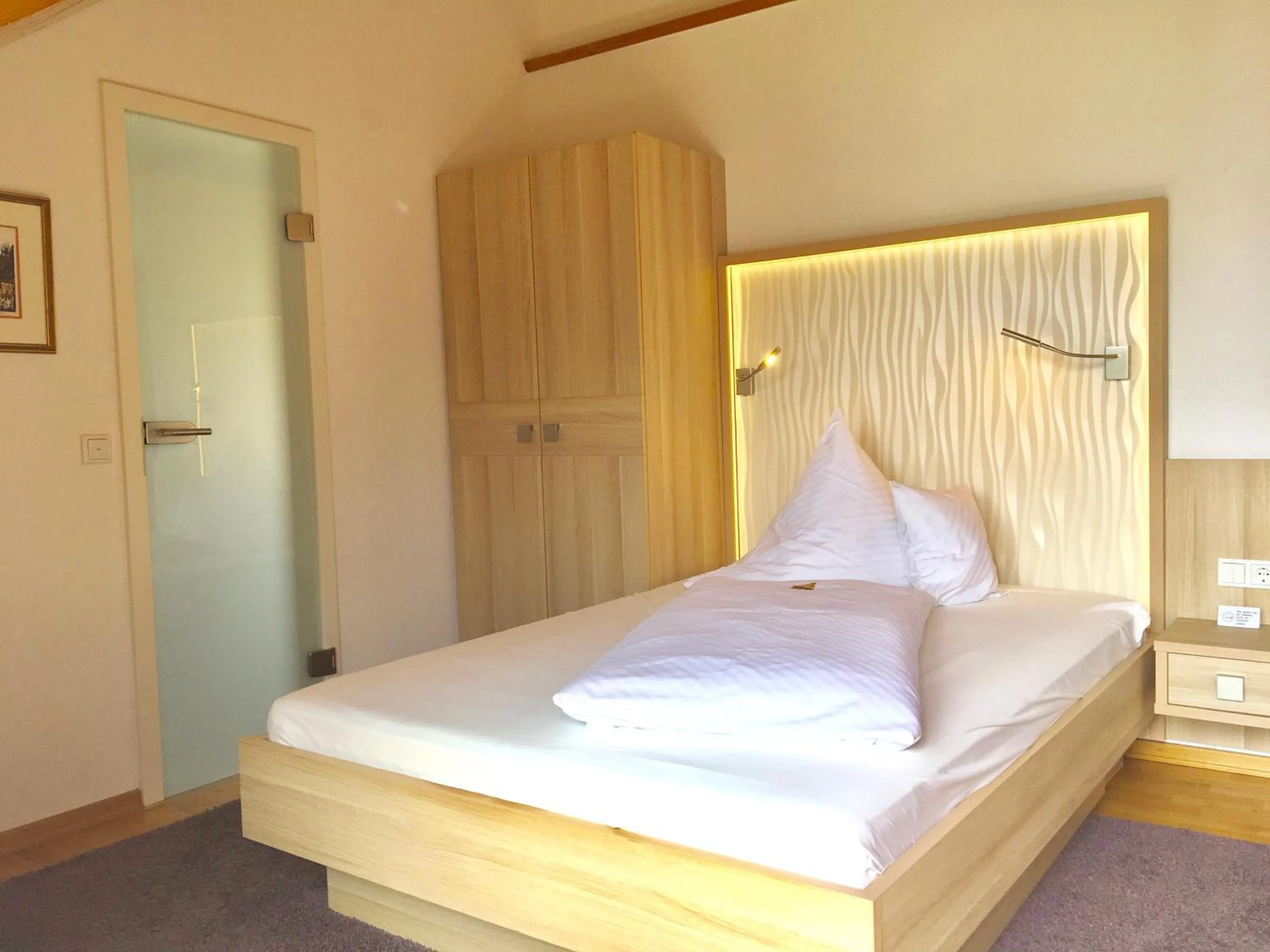 Decorative detail, Bed in Iris am See garni