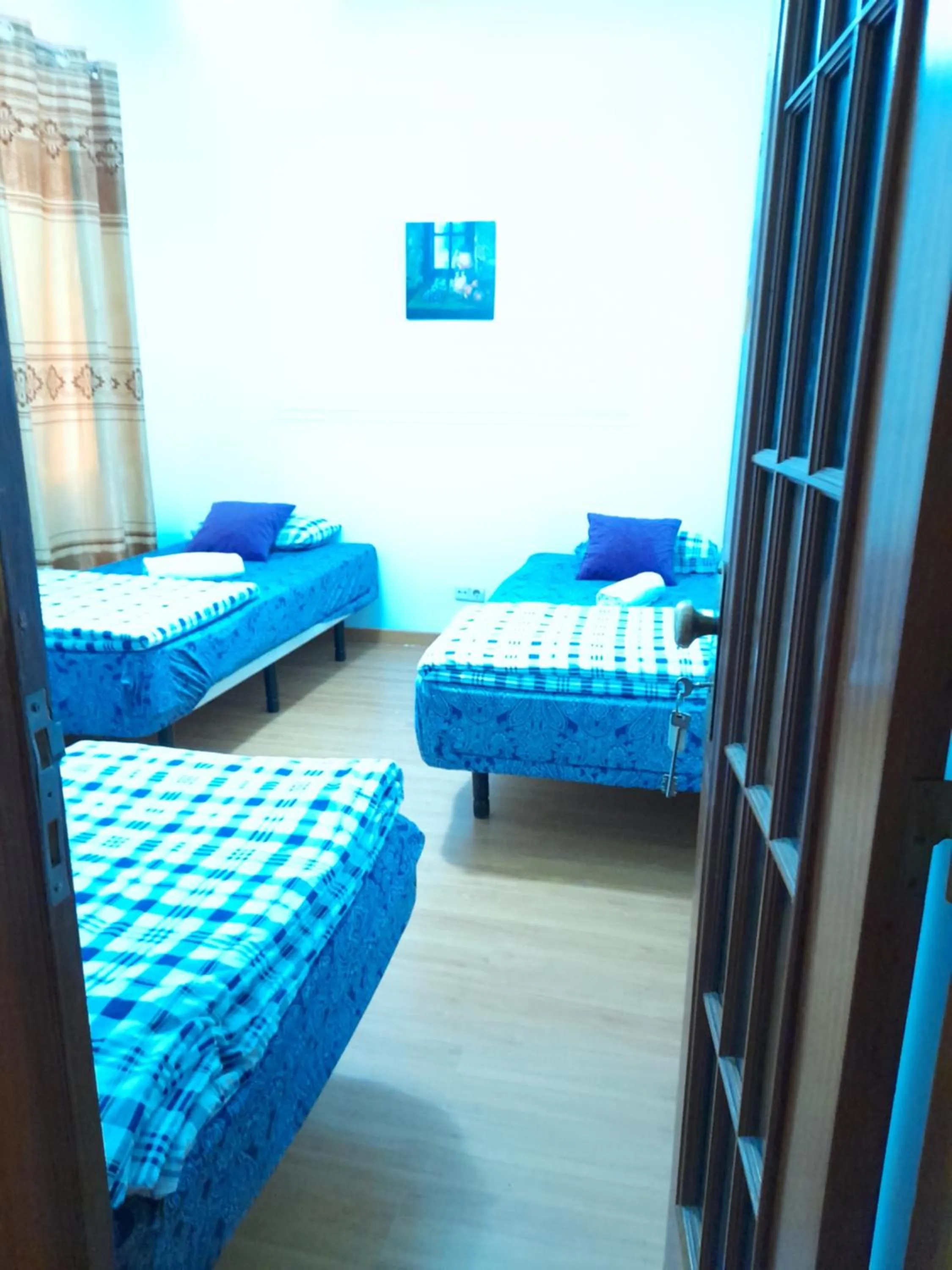 Bed in Garden Guest House