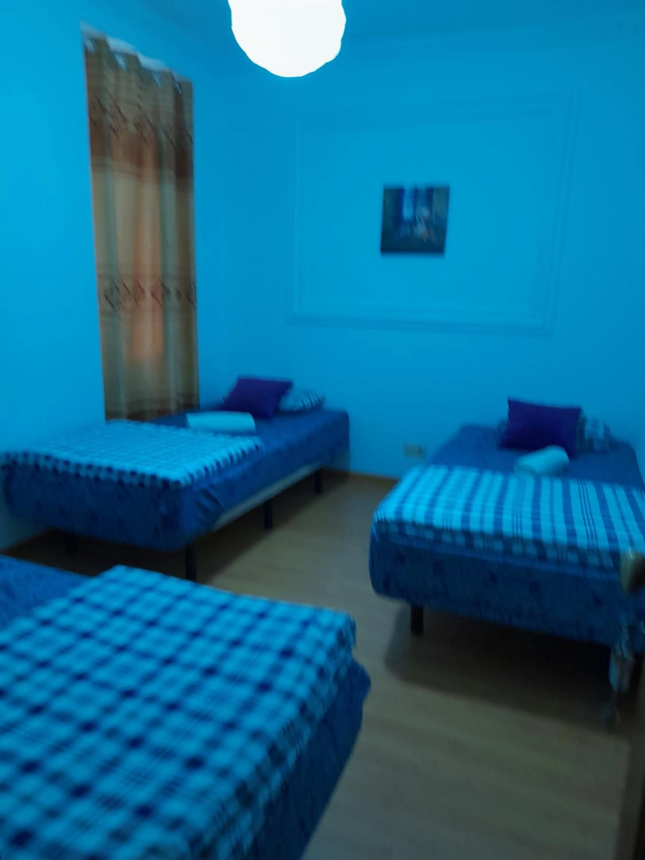 Bed in Garden Guest House