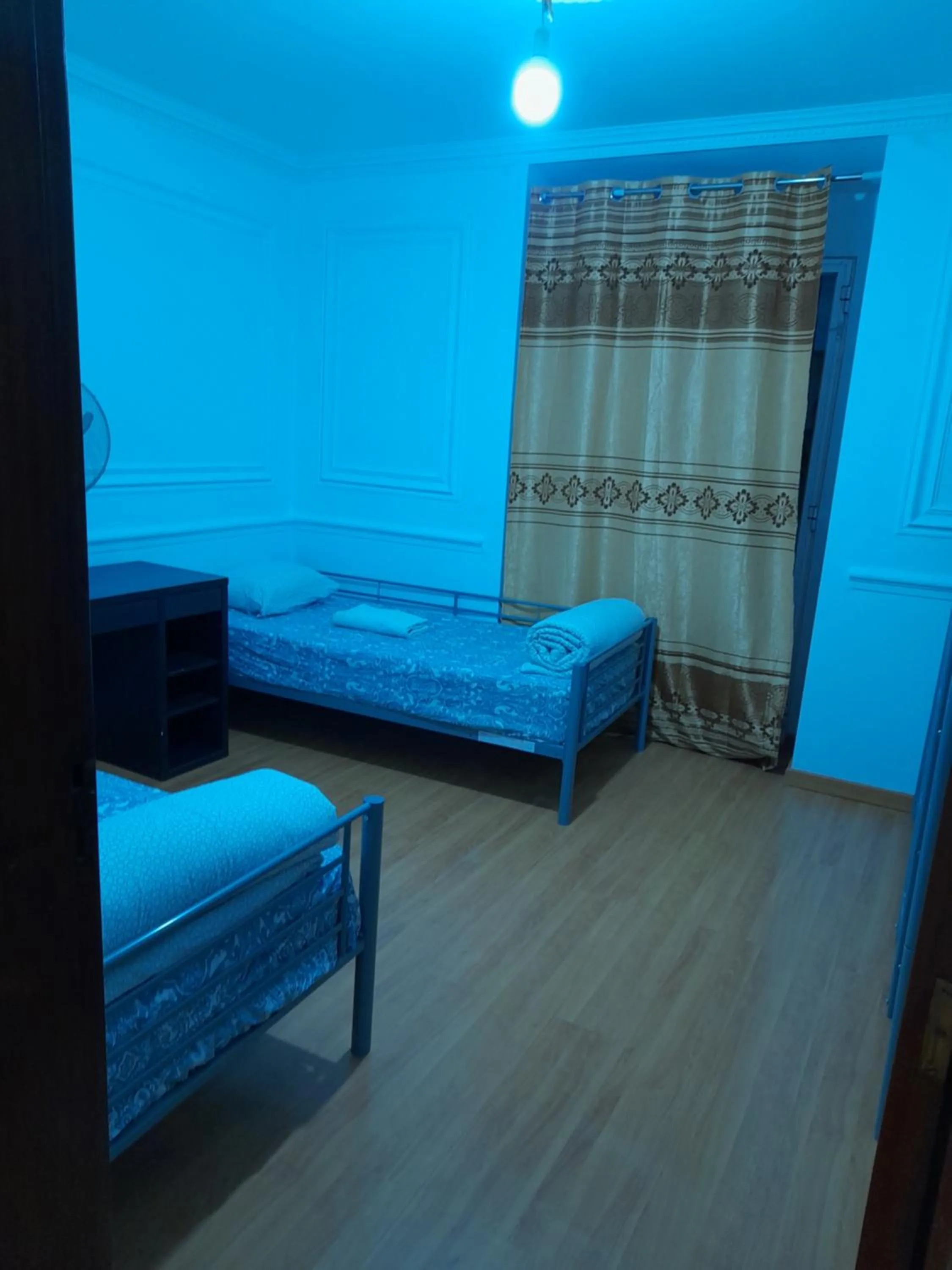 Bed in Garden Guest House