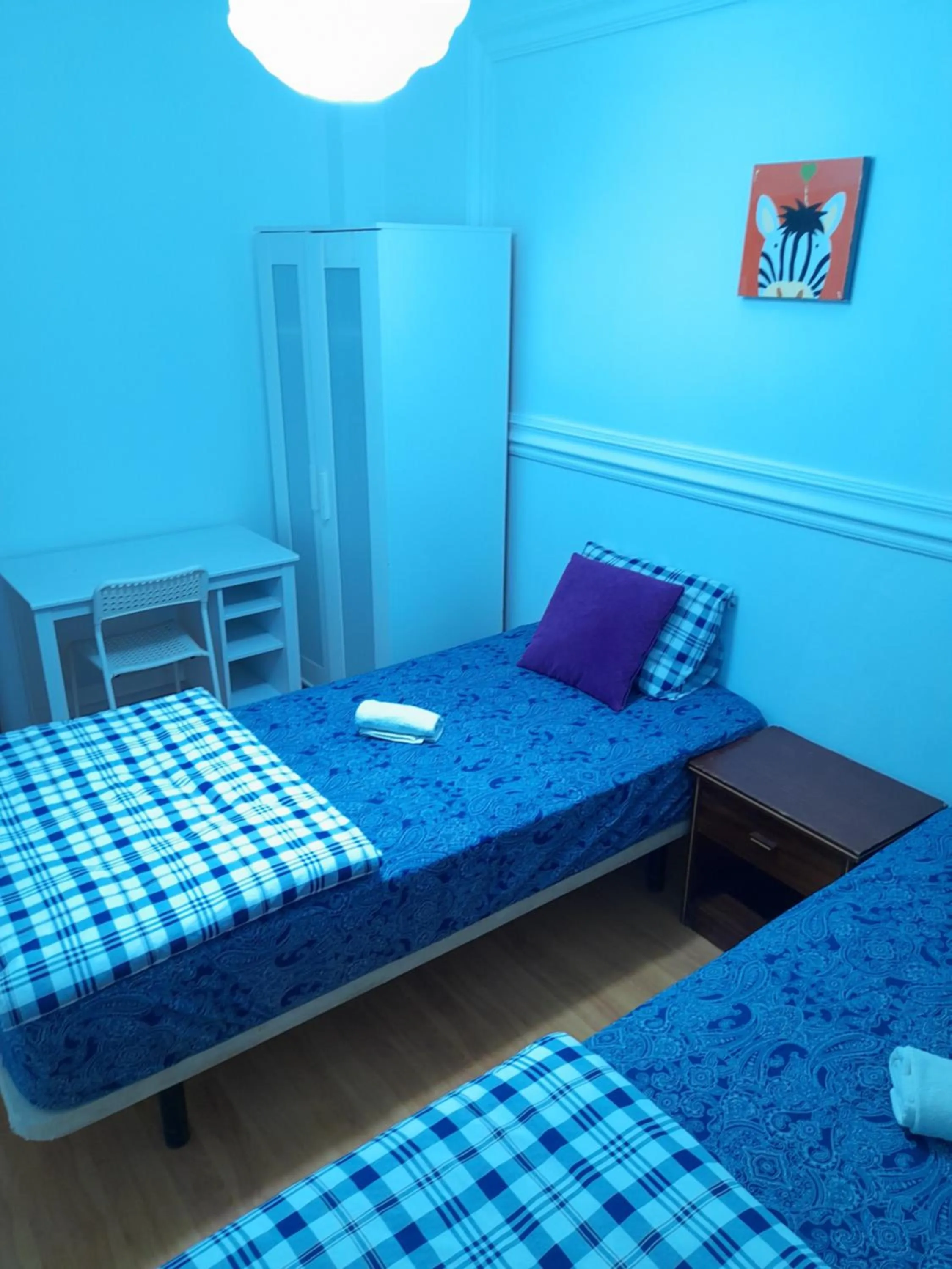 Bed in Garden Guest House