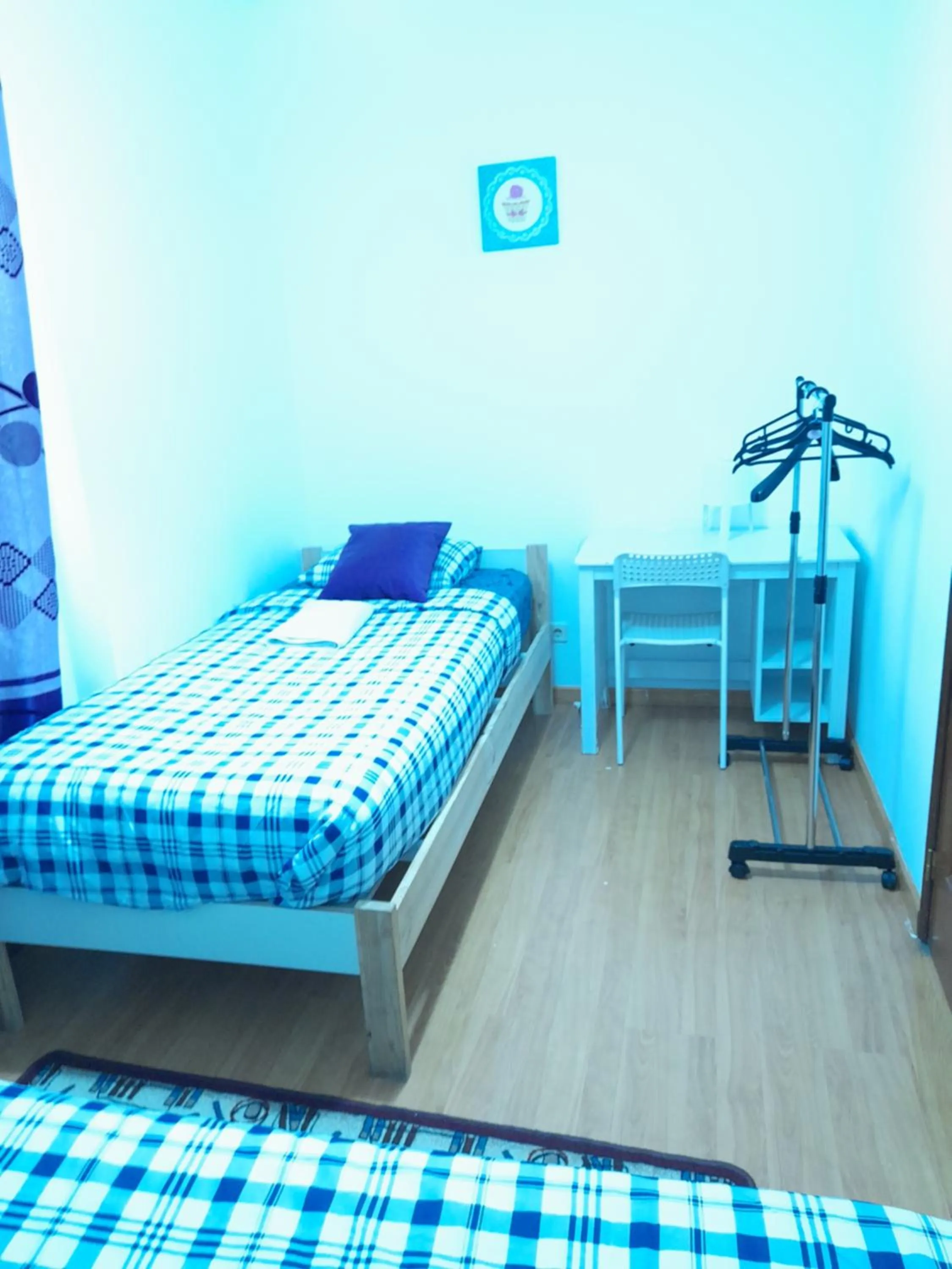 Bed in Garden Guest House