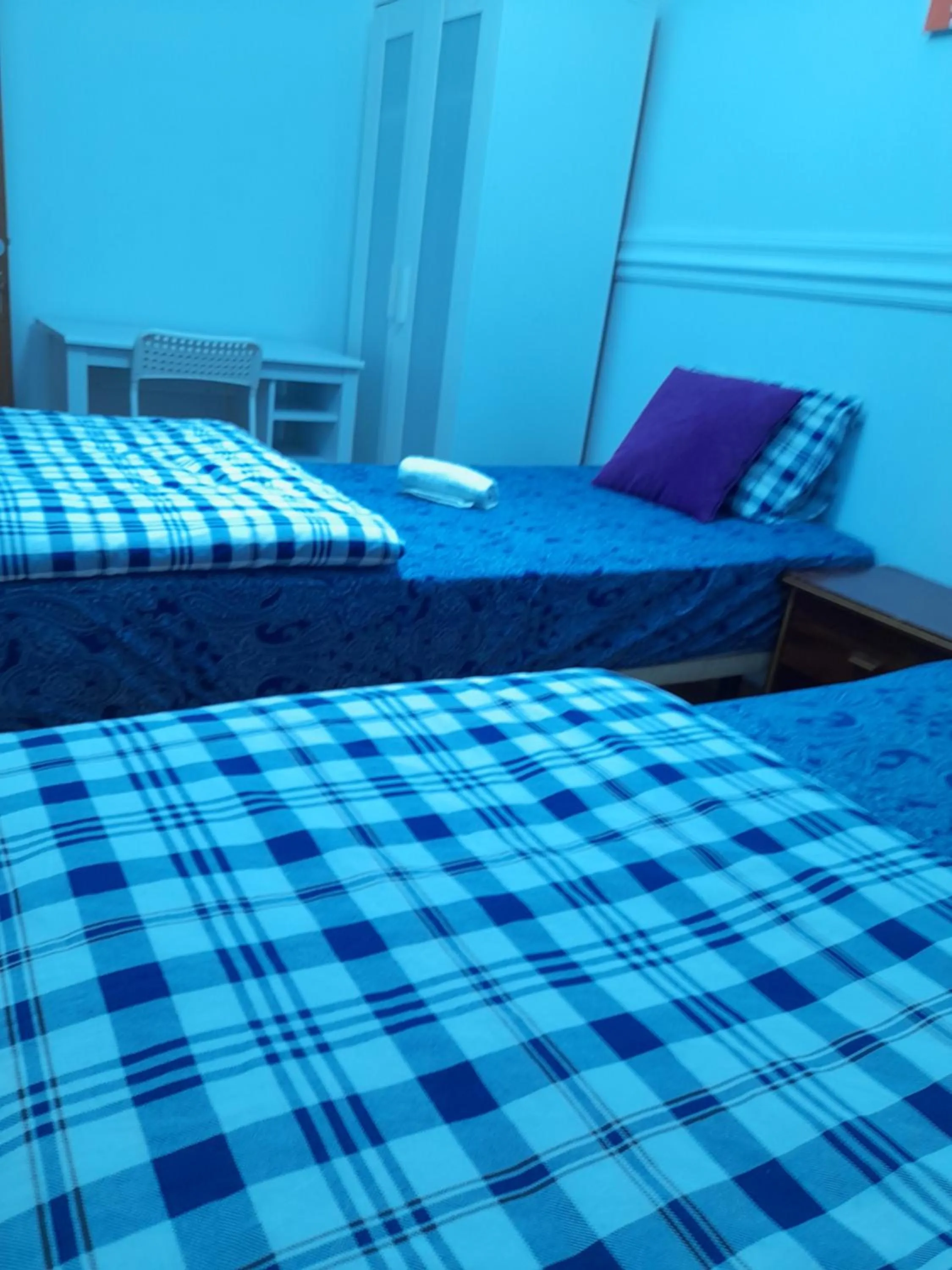 Bed in Garden Guest House