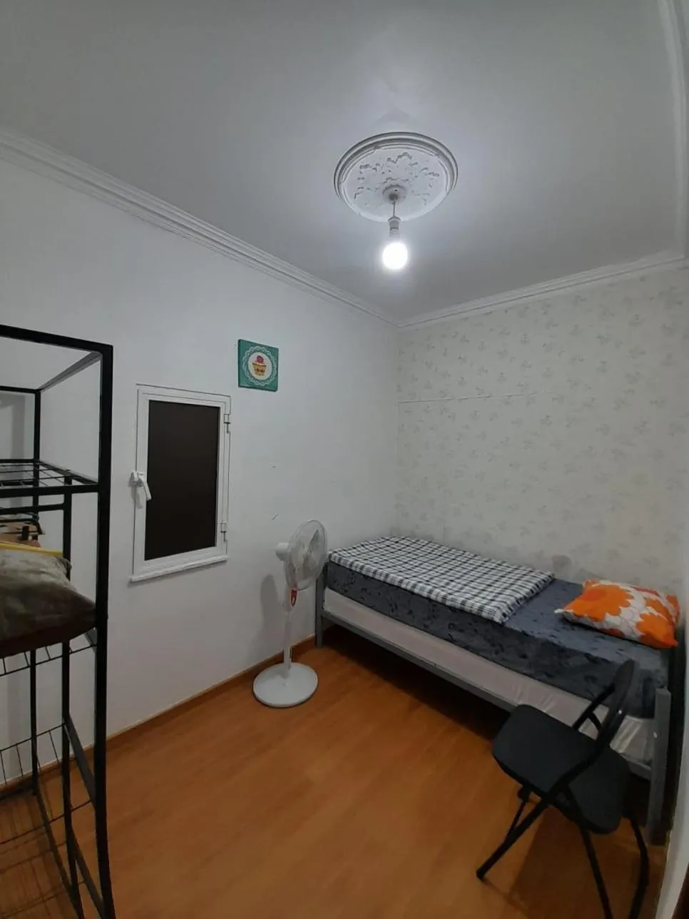 Bed in Garden Guest House