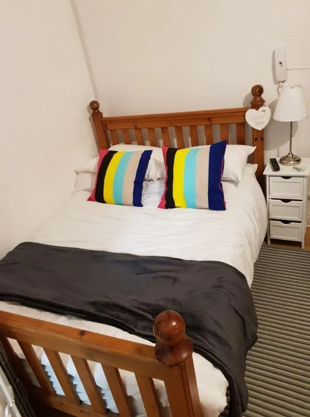 Bed in Quality Accommodation