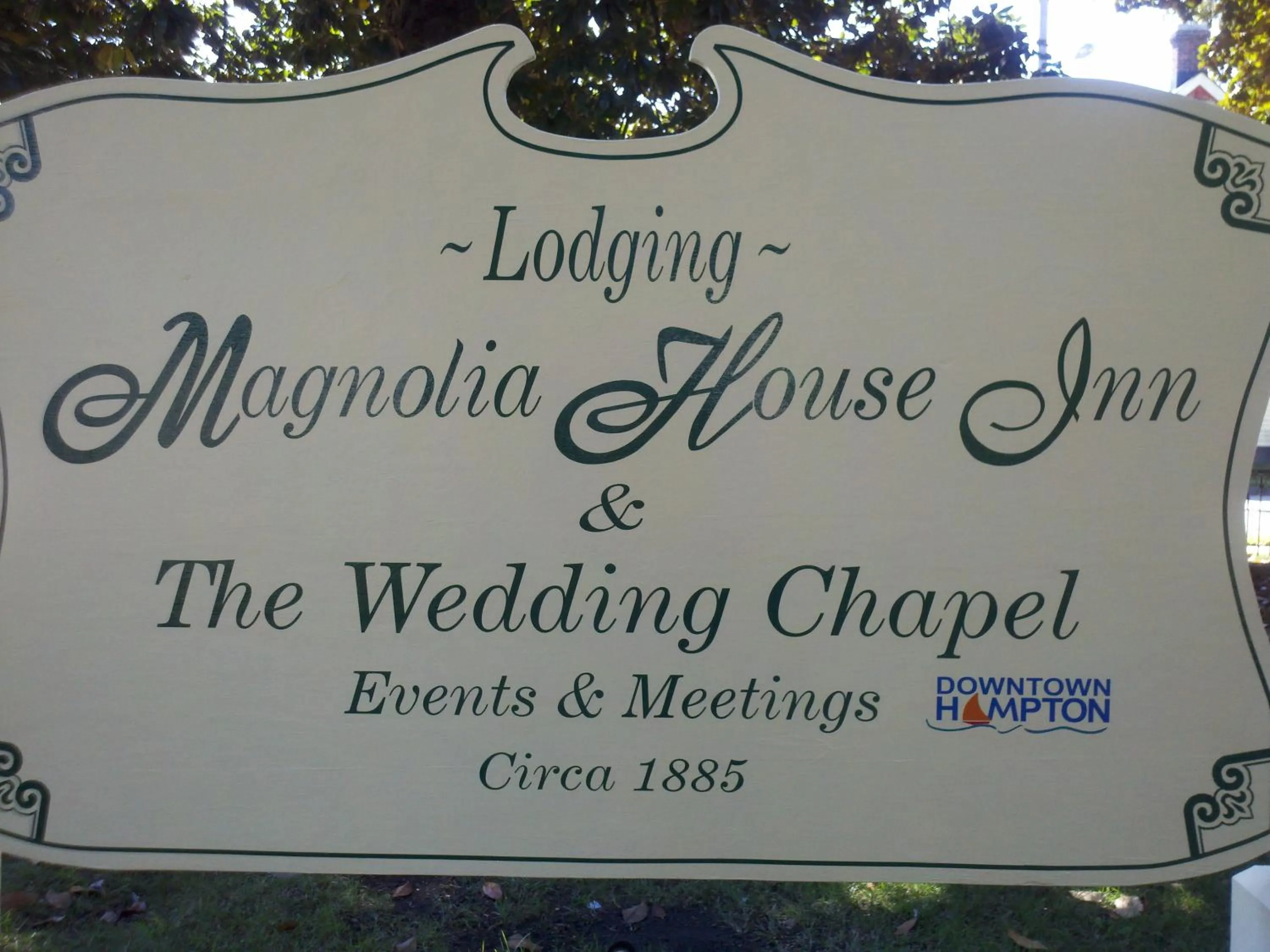 Property logo or sign in Magnolia House Inn