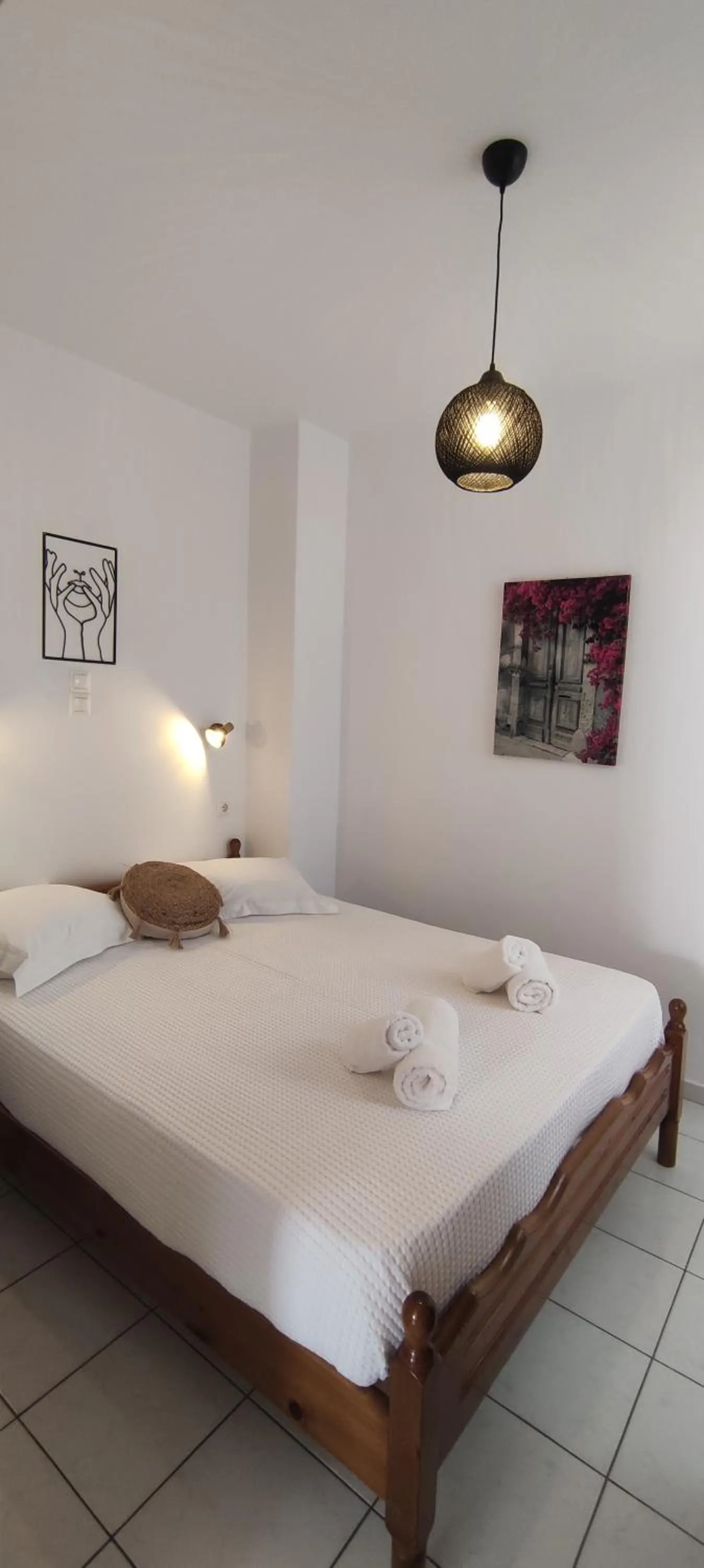 Bed in Kapetanos Rooms