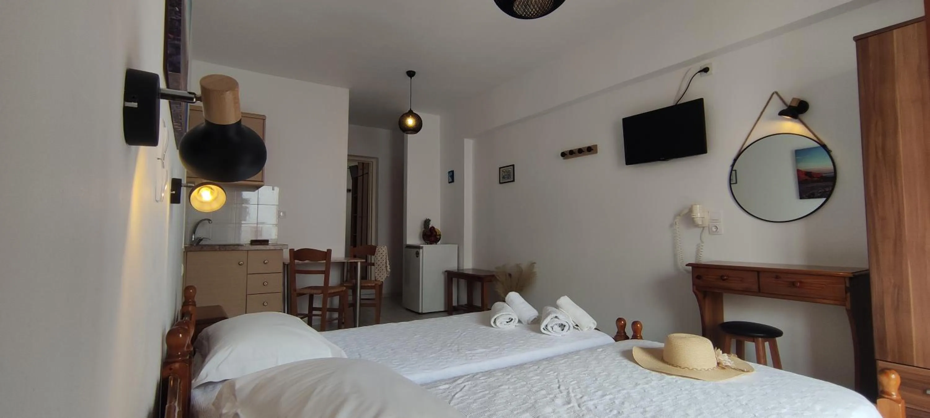 Bed in Kapetanos Rooms